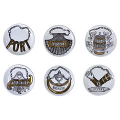Set di sottobicchieri da 3" a tema liquori Fornasetti - 'Vini e Liquori'