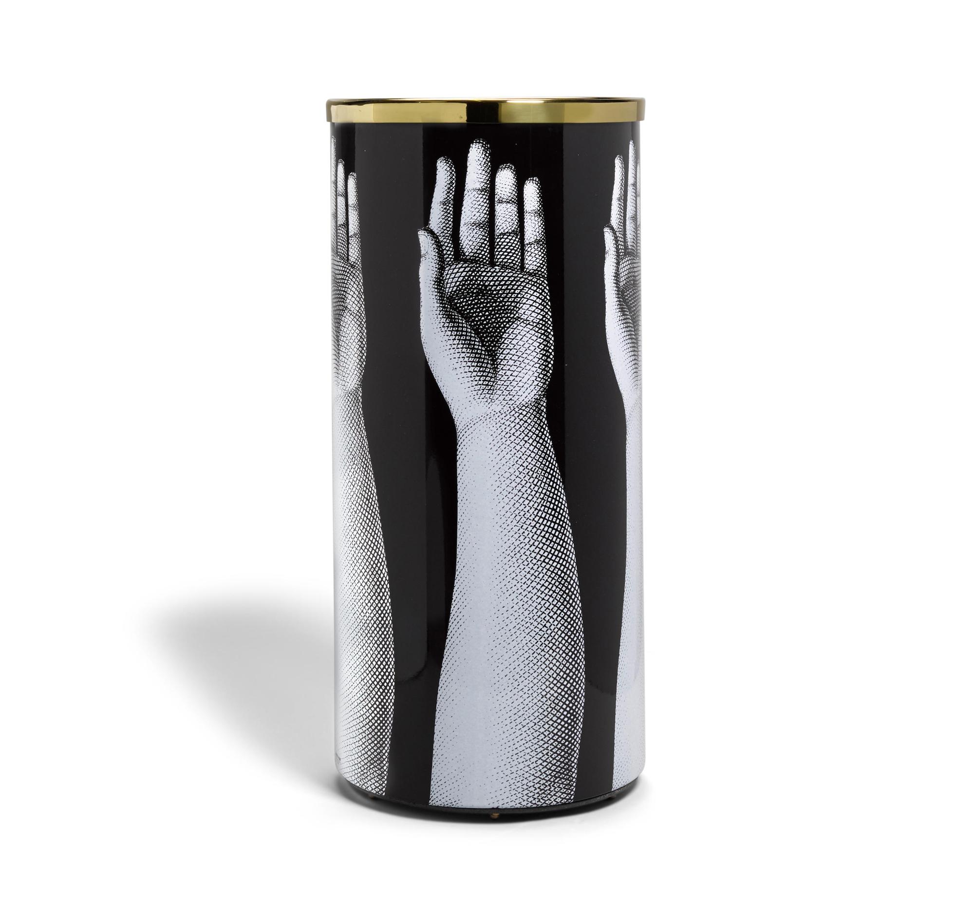 Atelier Fornasetti Mani Umbrella Stand,
Signed & Dated 2007

The Fornasetti cylindrical umbrella stand is decorated with the Mani pattern which is an extended arm on a black background.

Piero Fornasetti always attached great importance to
