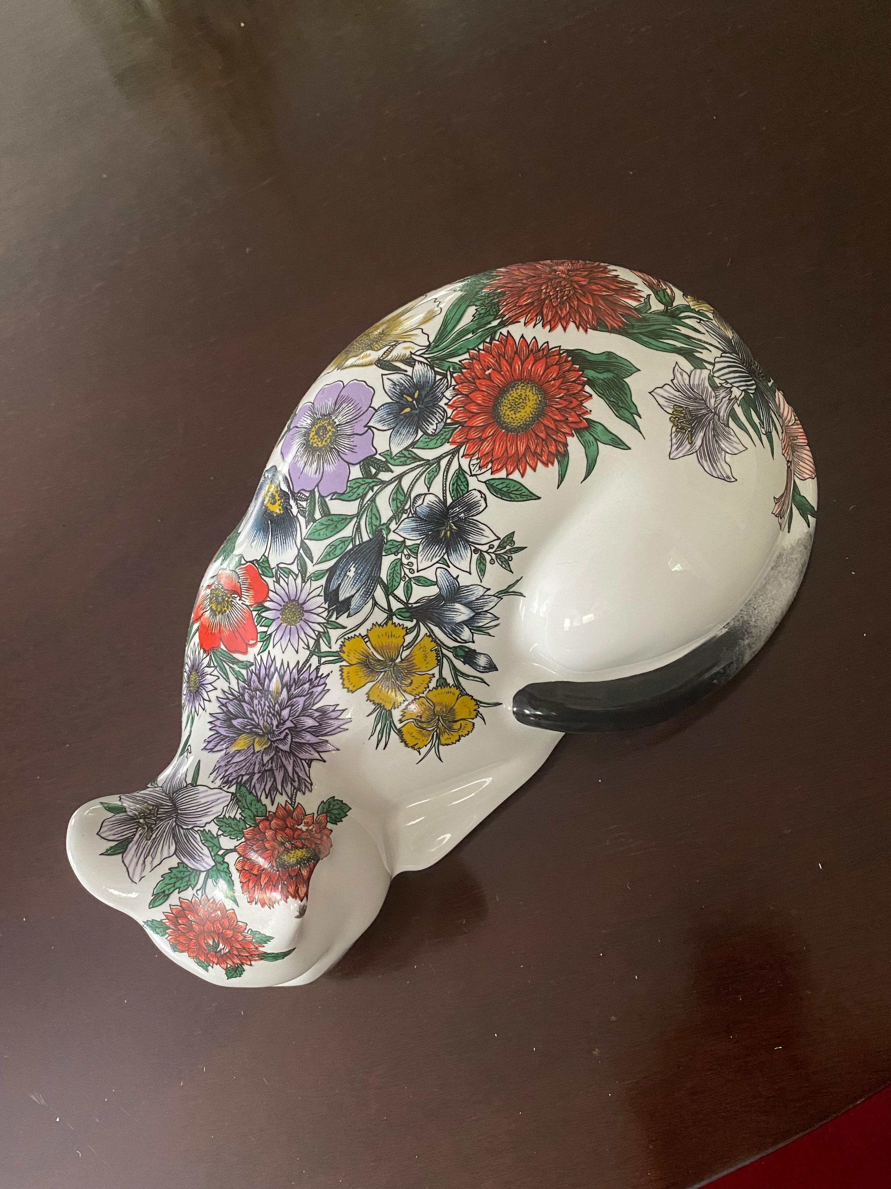 Fornasetti floral decorated sleeping cat - larger version.
mid century Italian design

approx 12 x 7 x 5.5 inches high
