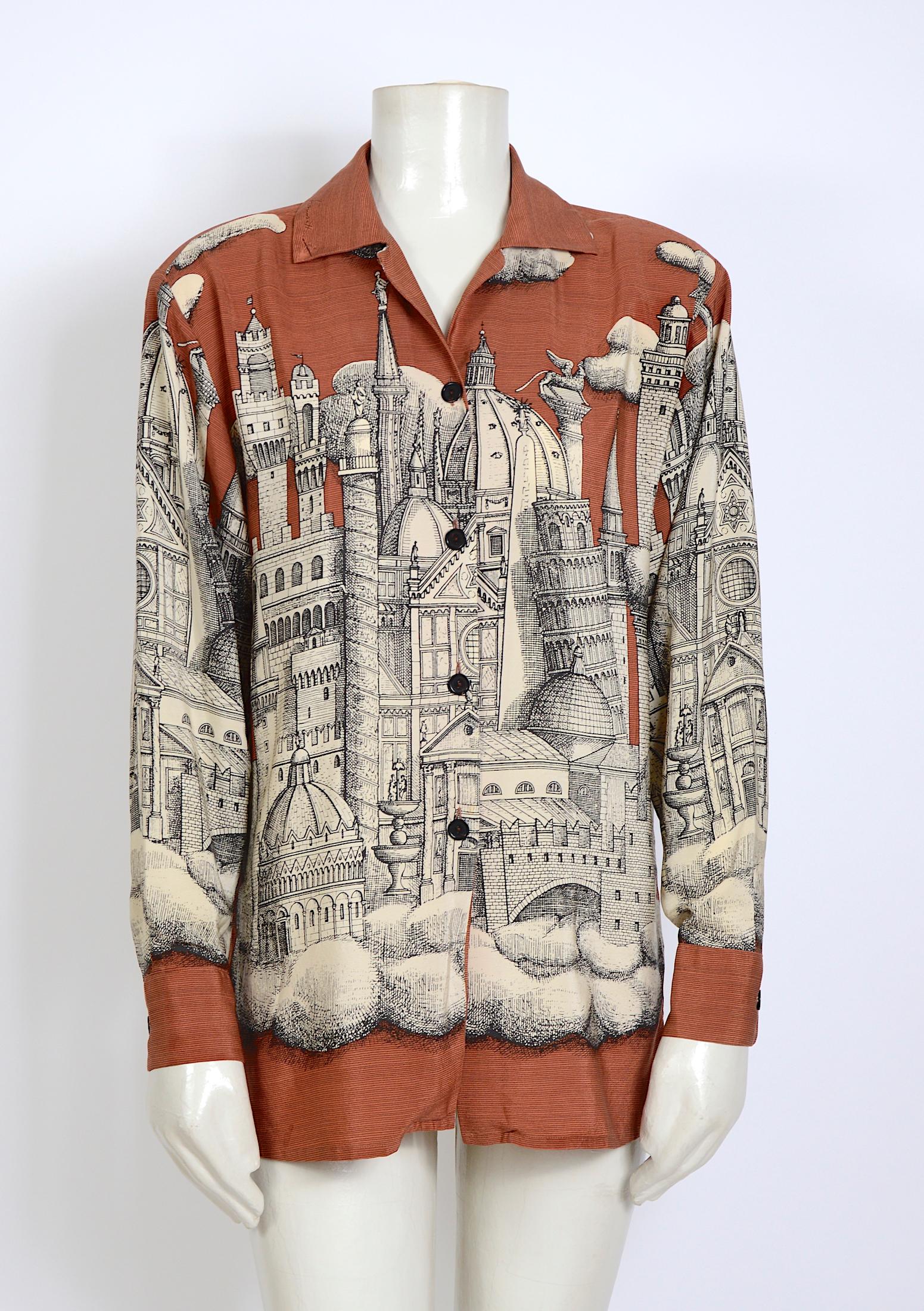 A beautiful vintage original silk print by Fornasetti blouse. Signed on the collar.
Beautiful condition
Made in Italy - Size 42 - 100% silk
Please go by measurements that are taken flat
Sh to Sh 17,5inch/44cm - Ua to Ua 19,5inch/49,5cm(x2) - Waist
