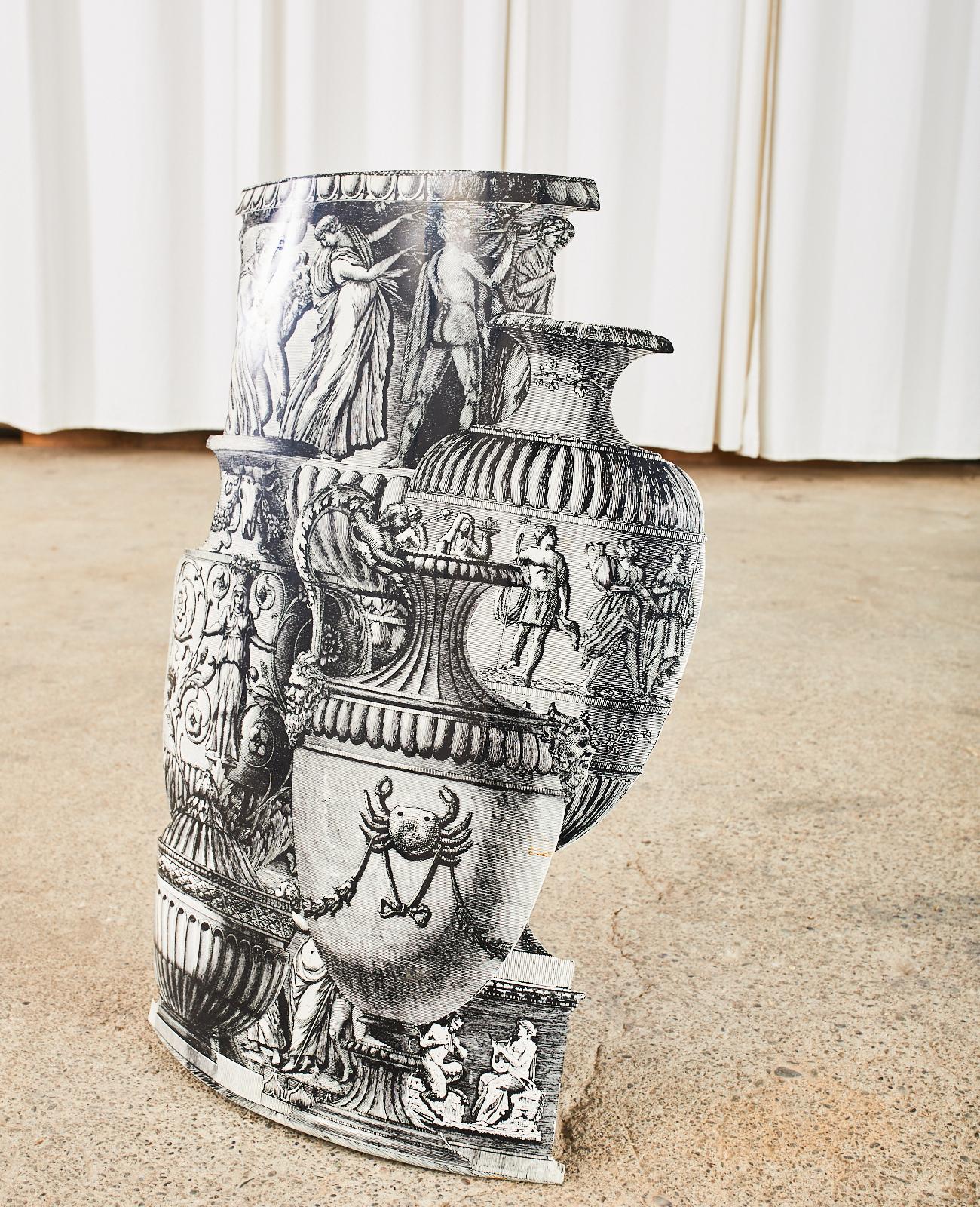 Sublime Piero Fornasetti umbrella stand crafted from hand silk screened and lacquered metal. Trompe l'oeil vasi antichi or antique vases features Greco-Roman decorated vases in a curved 3-D artwork. Original tags from I. Magnin in San Francisco and