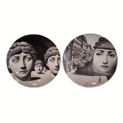 Fornasetti Pair of porcelain plates “Tema e Variazioni 223 and 205 Italy