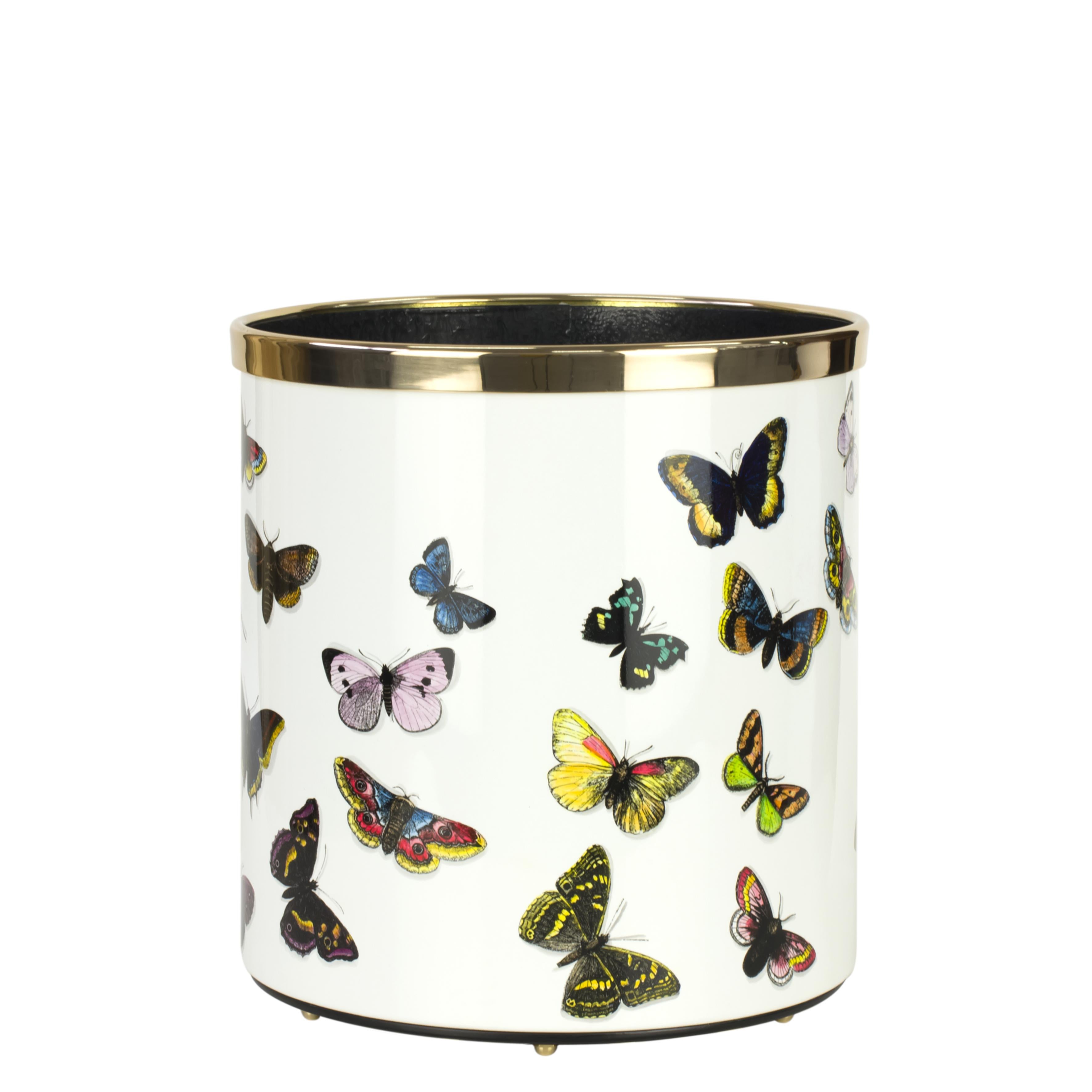 Like all Fornasetti accessories, the paper basket is handcrafted using original artisan techniques. This piece is silk-screened by hand, painted by hand and covered with a smooth lacquer.

The shape is still the same designed by Piero Fornasetti