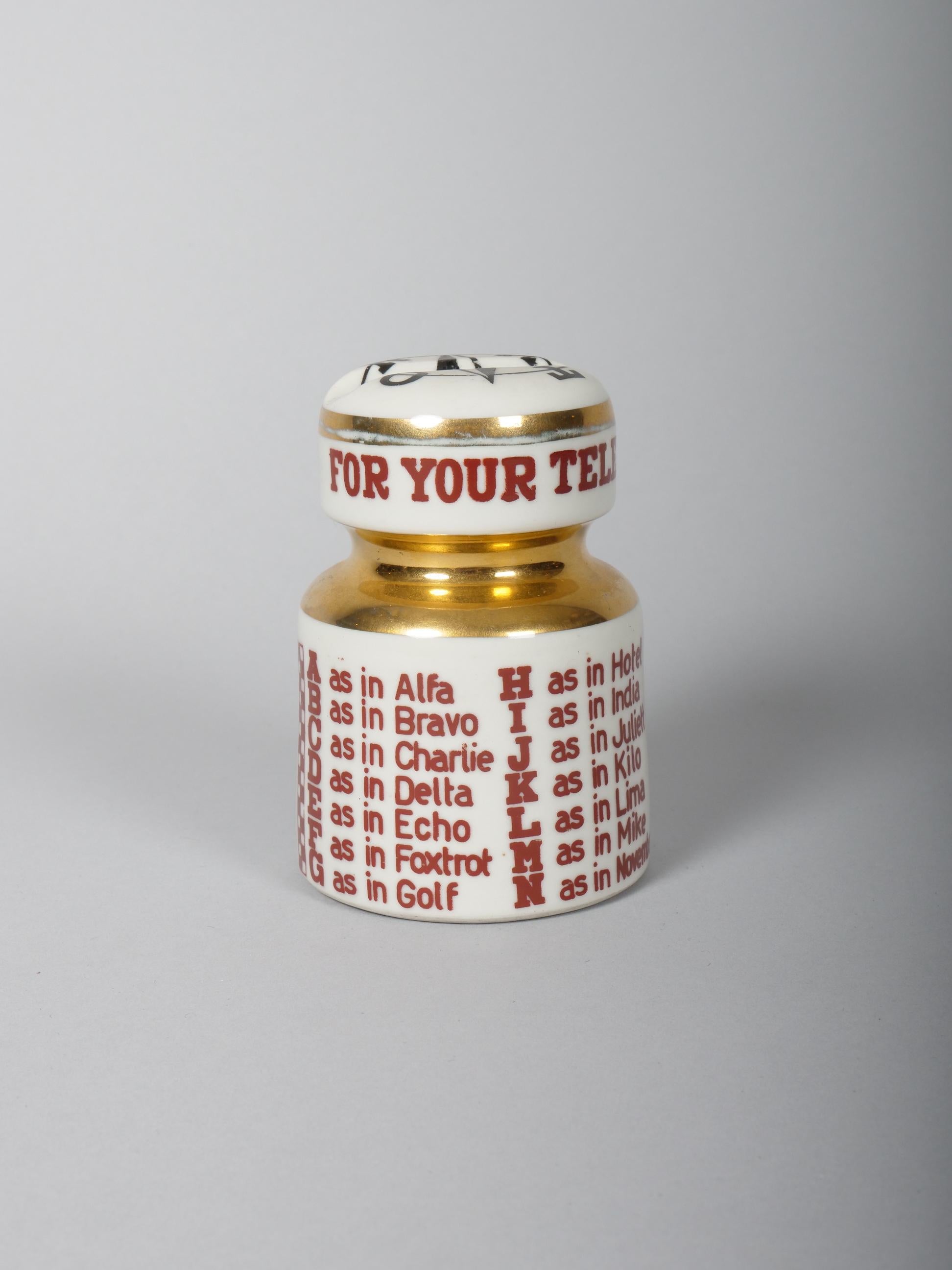 Italian Fornasetti paper weight with NATO phonetic alphabet with pen rest For Sale