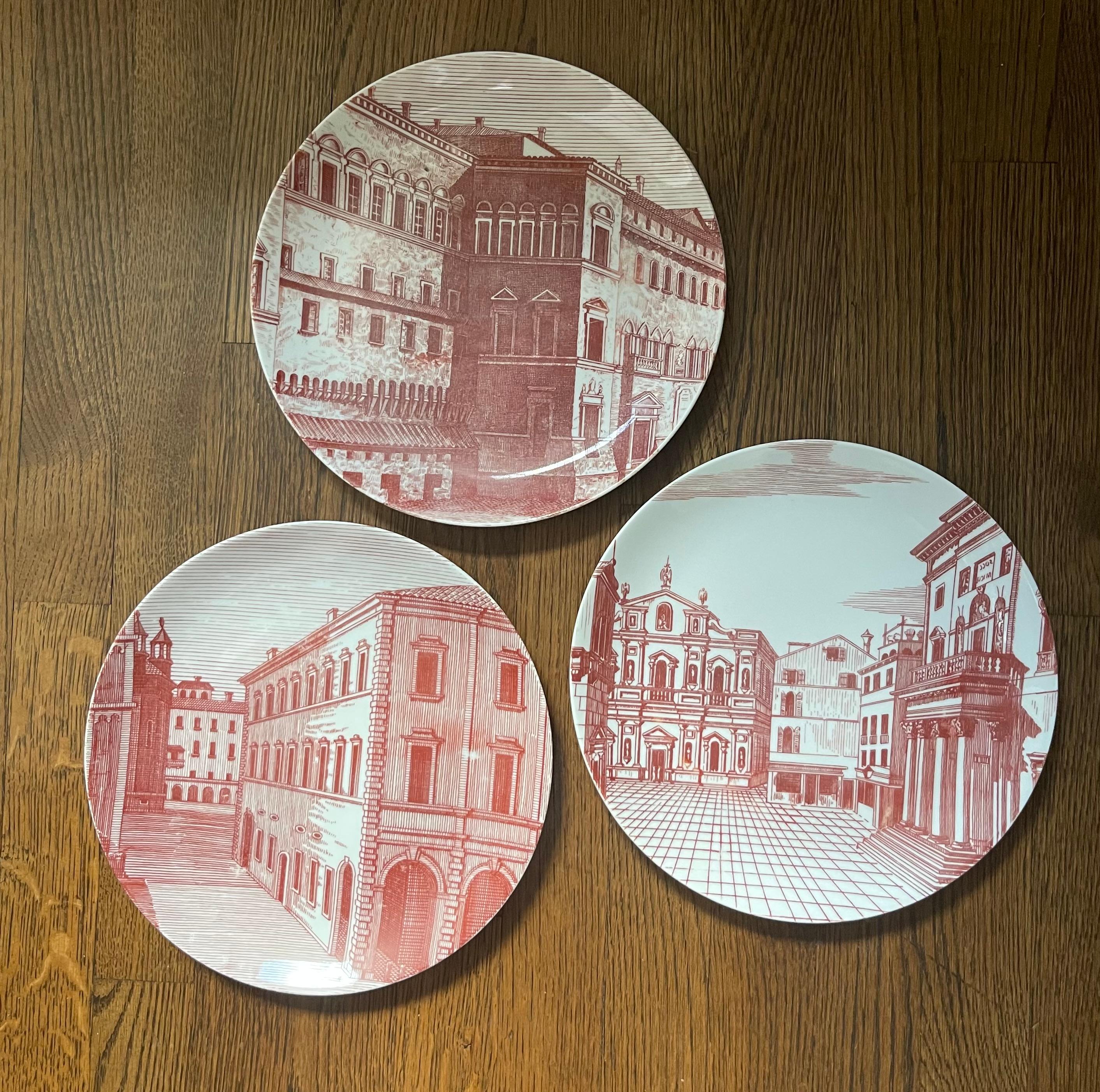 Please note:  the price is for the set of three plates. 

Three plates from Piero Fornasetti’s “Prospettiva” series.   Vintage 1950’s material, not reissued.  

A beautiful red tint edition in very good condition for their age, with only one small