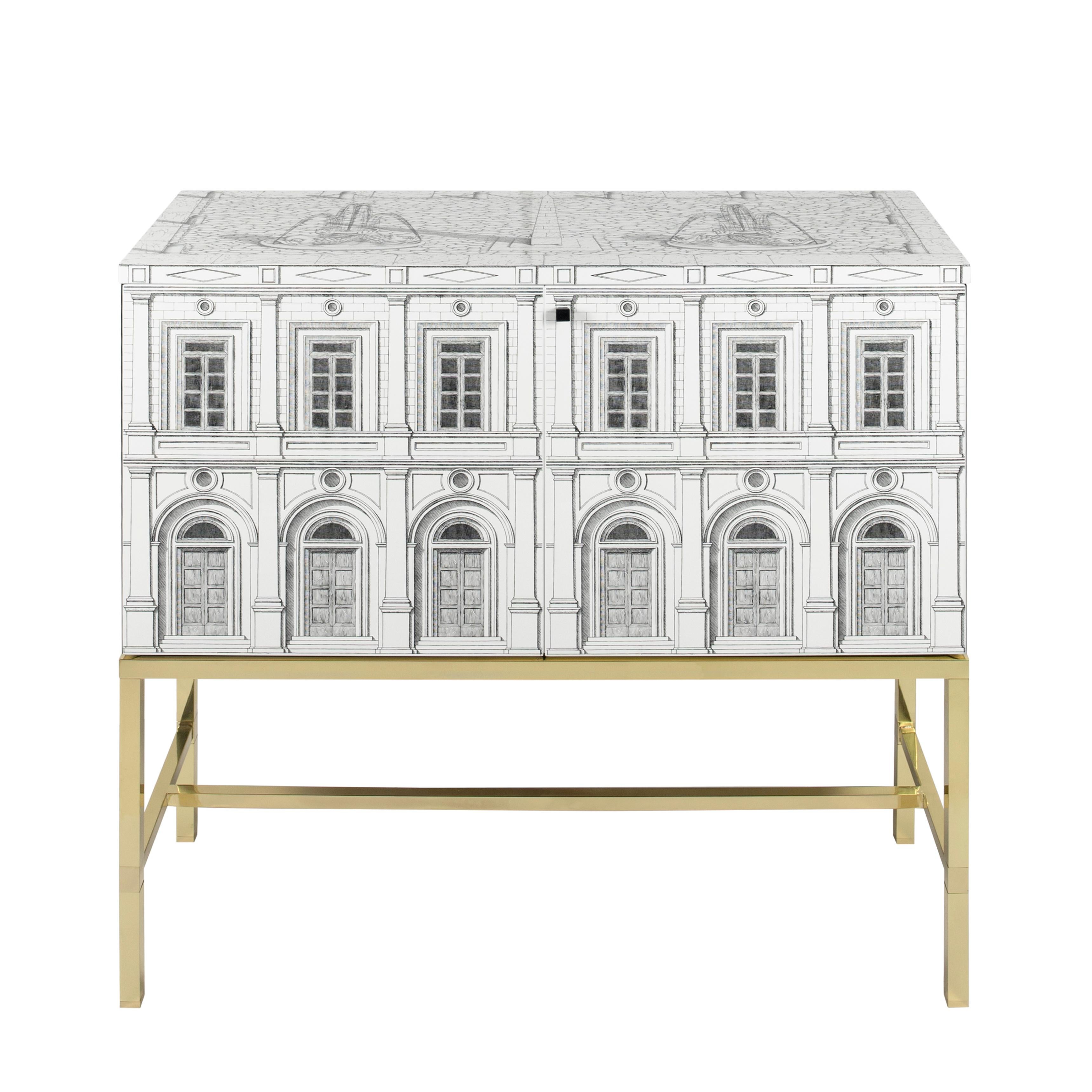 This shape and size of the cabinet was designed by Fornasetti in 2019 on the occasion of the the Milan Design Week. 

Like all Fornasetti pieces of furniture, it is hand-crafted using original artisan techniques.
This cabinet is silk-screened by