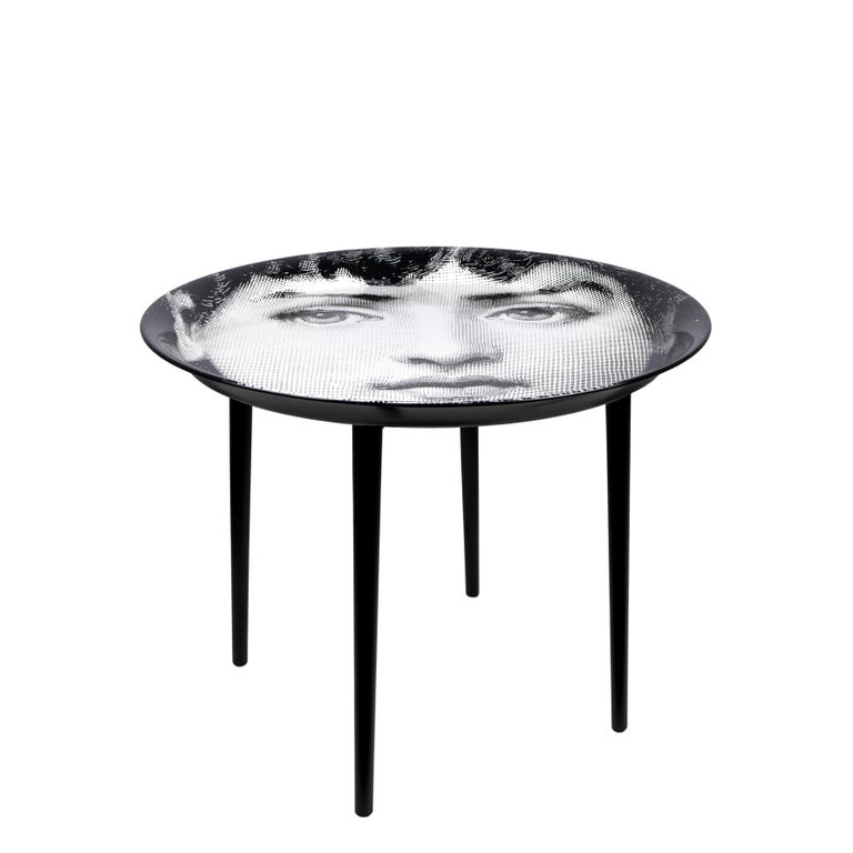 Like all Fornasetti accessories, the tray is hand-crafted using original artisan techniques. Measures: 60cm Diameter
This tray is silk-screened by hand and covered with a smooth lacquer.

  

The tray is the object with more variations than any