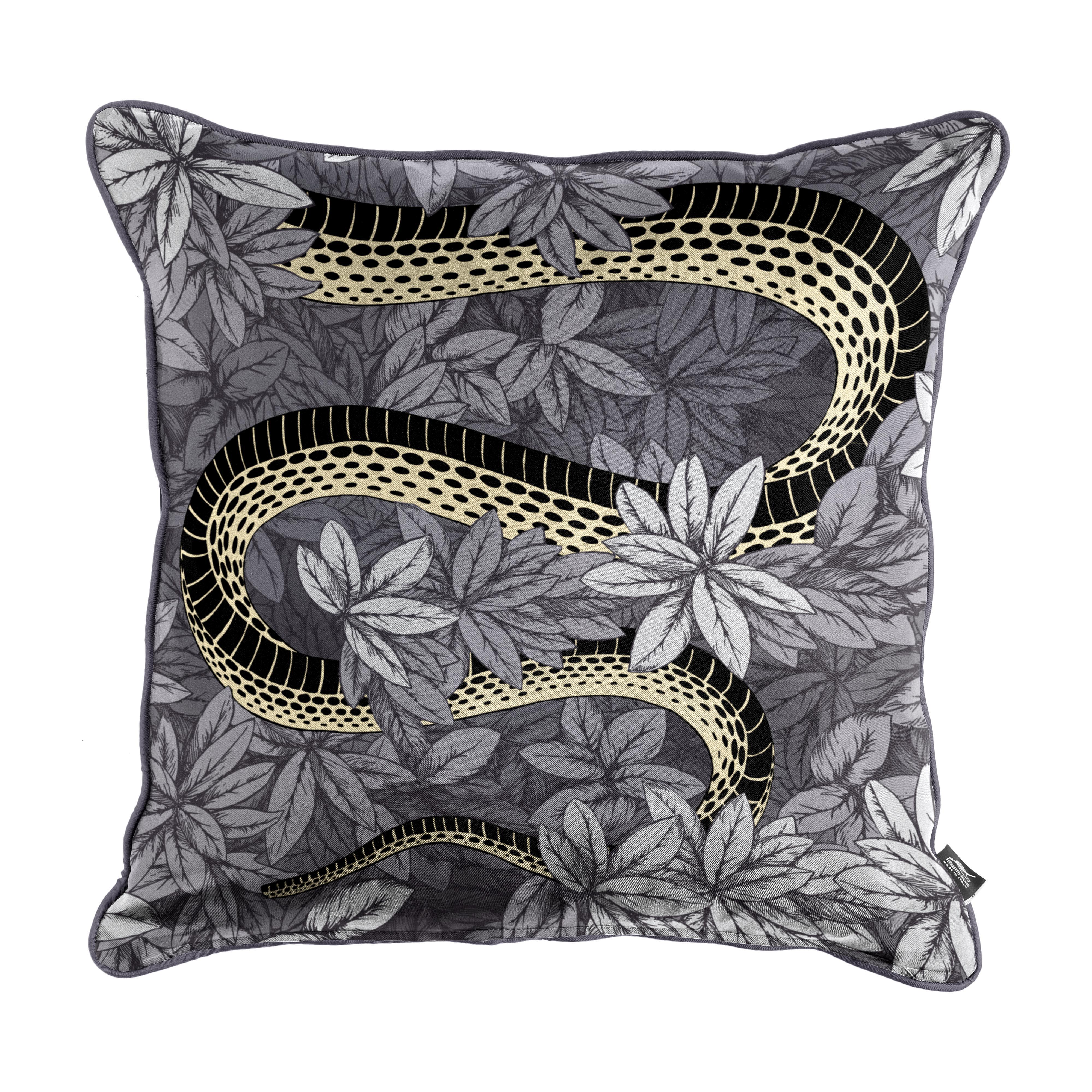 The Fornasetti cushions will add to each room an unexpected detail thanks to the most iconic Italian atelier designs. 

The decoration features a snake holding the forbidden fruit in its jaws, and surrounded by hand painted leaves. It is inspired