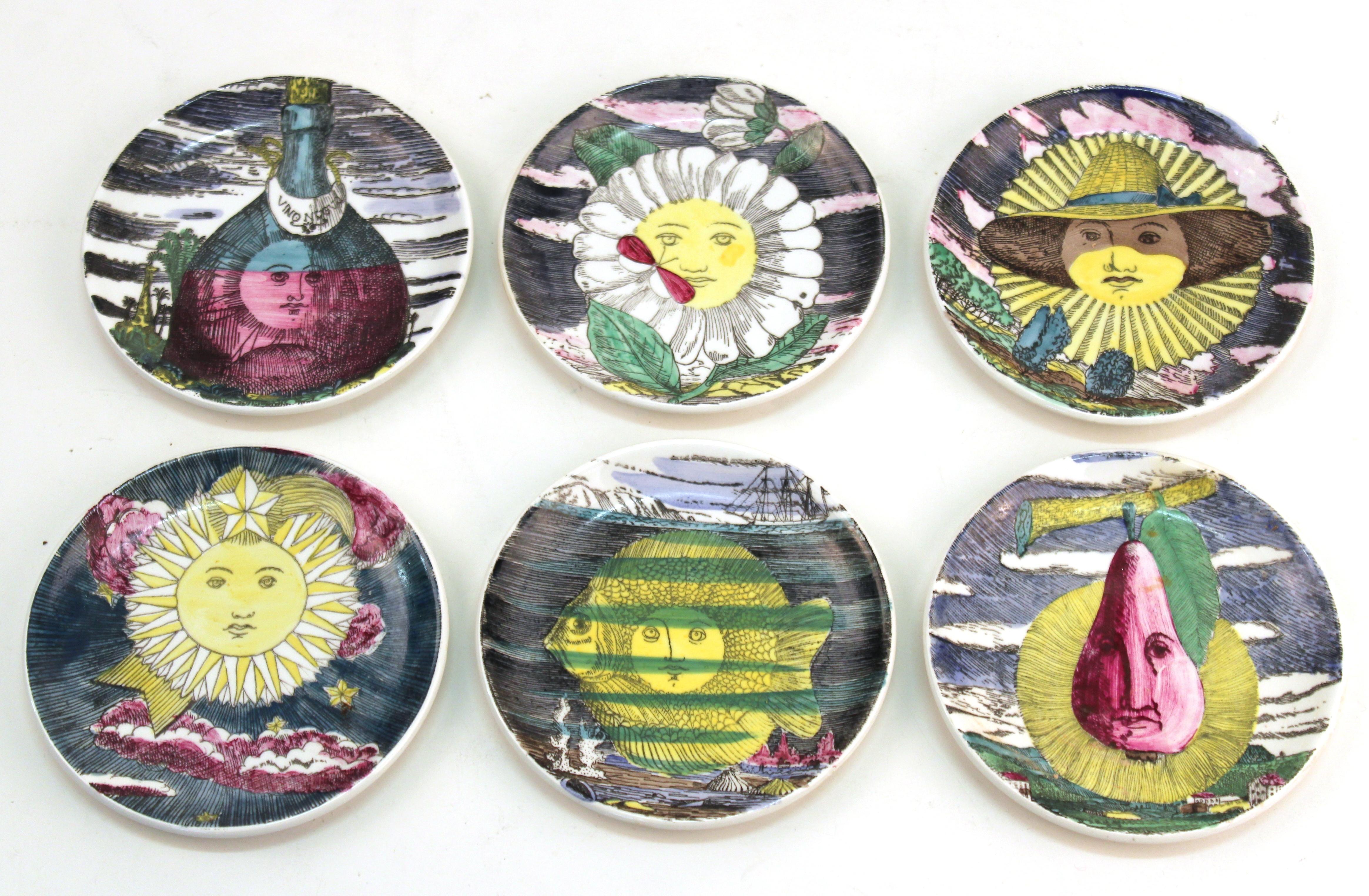 Italian Mid-Century Modern set of six coasters designed by Piero Fornasetti in the 1960s. The set comes with its original box and showcases a design depicting sun and moon motifs based on illustrations from a lunar almanac from the 1940s. Marked
