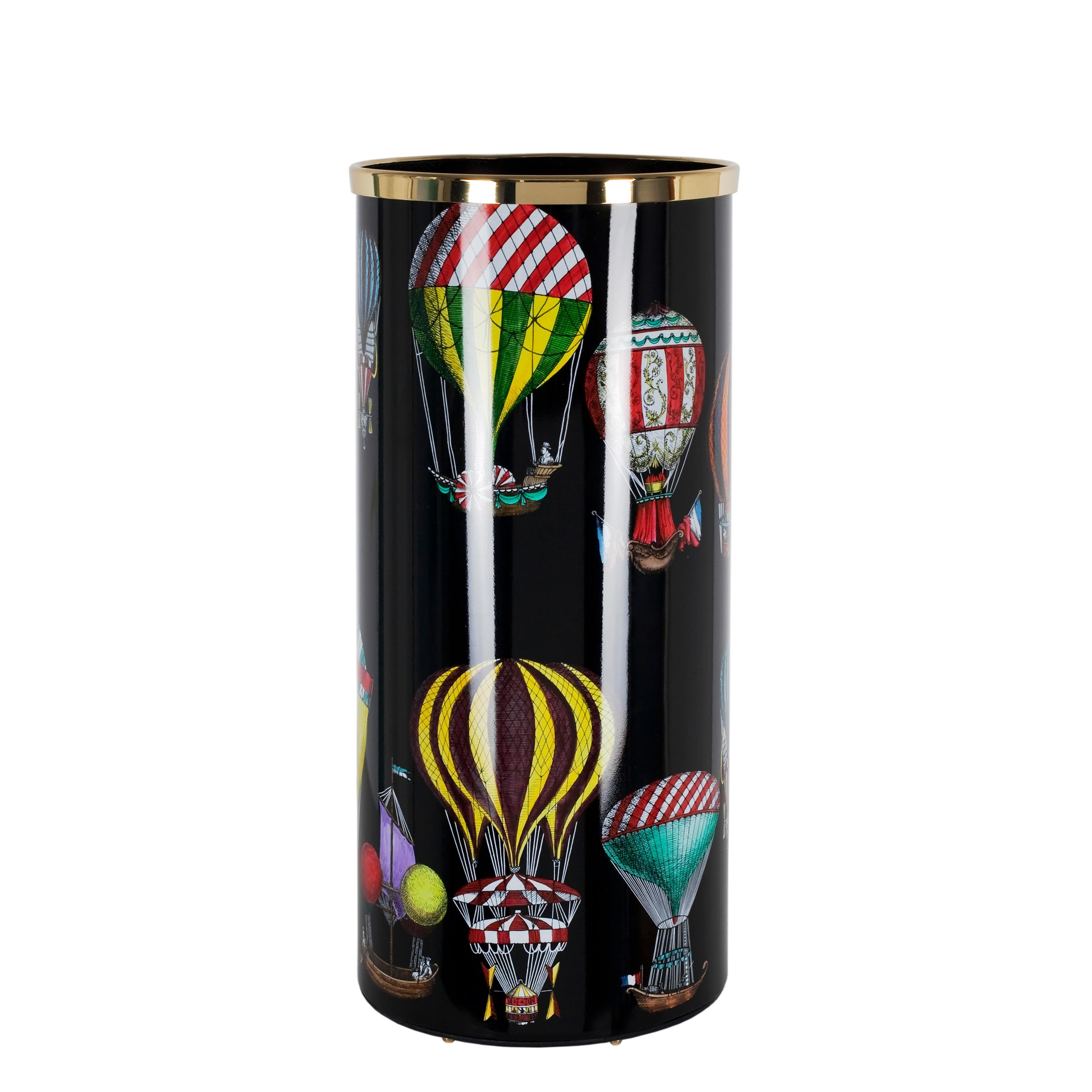 Like all Fornasetti accessories, the umbrella stand is handcrafted using original artisan techniques. This piece is silk-screened by hand, painted by hand and covered with a smooth lacquer.

The shape is still the same designed by Piero Fornasetti
