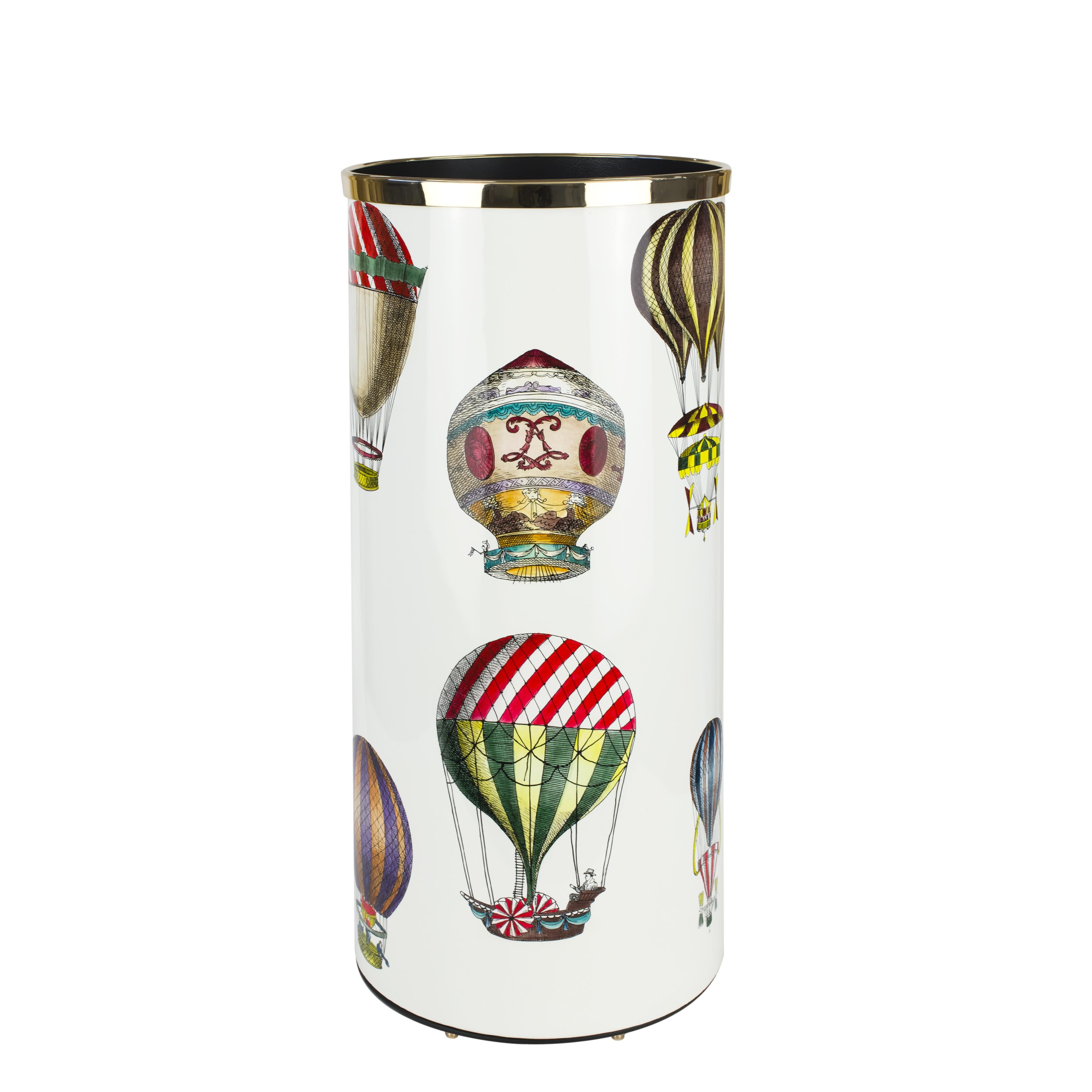 Like all Fornasetti accessories, the umbrella stand is handcrafted using original artisan techniques. This piece is silk-screened by hand, painted by hand and covered with a smooth lacquer.

The shape is still the same designed by Piero Fornasetti