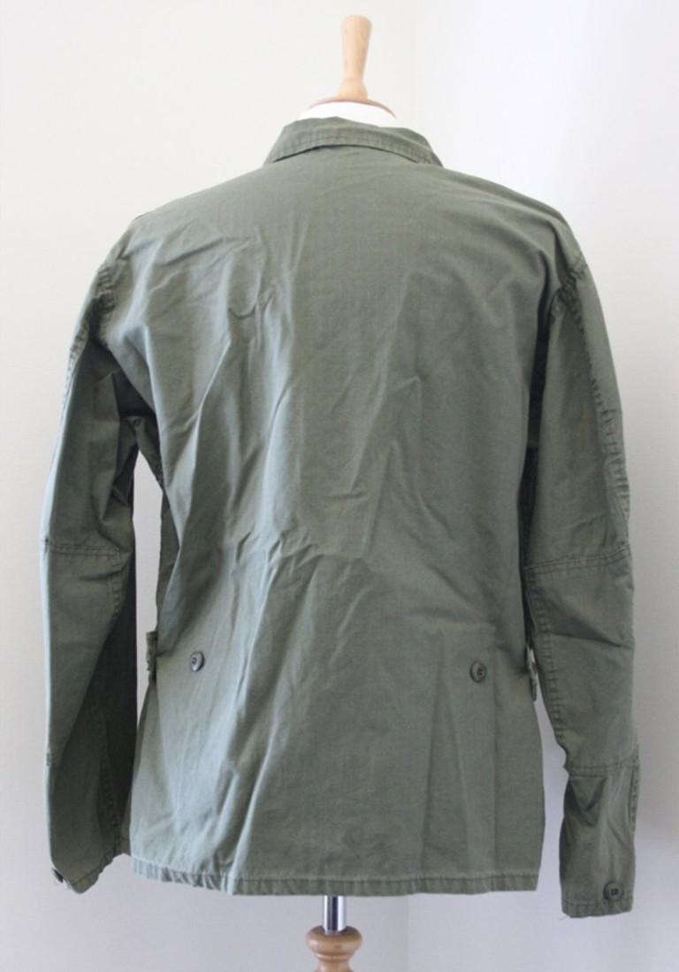 An army fatigue jacket from the wardrobe department of the Forrest Gump movie, signed clearly by Tom Hanks on the sleeve in black marker pen.

In excellent condition.

Provenance: Ex The Dick Clark Collection.

Tom Hanks (Born 1956) is an American