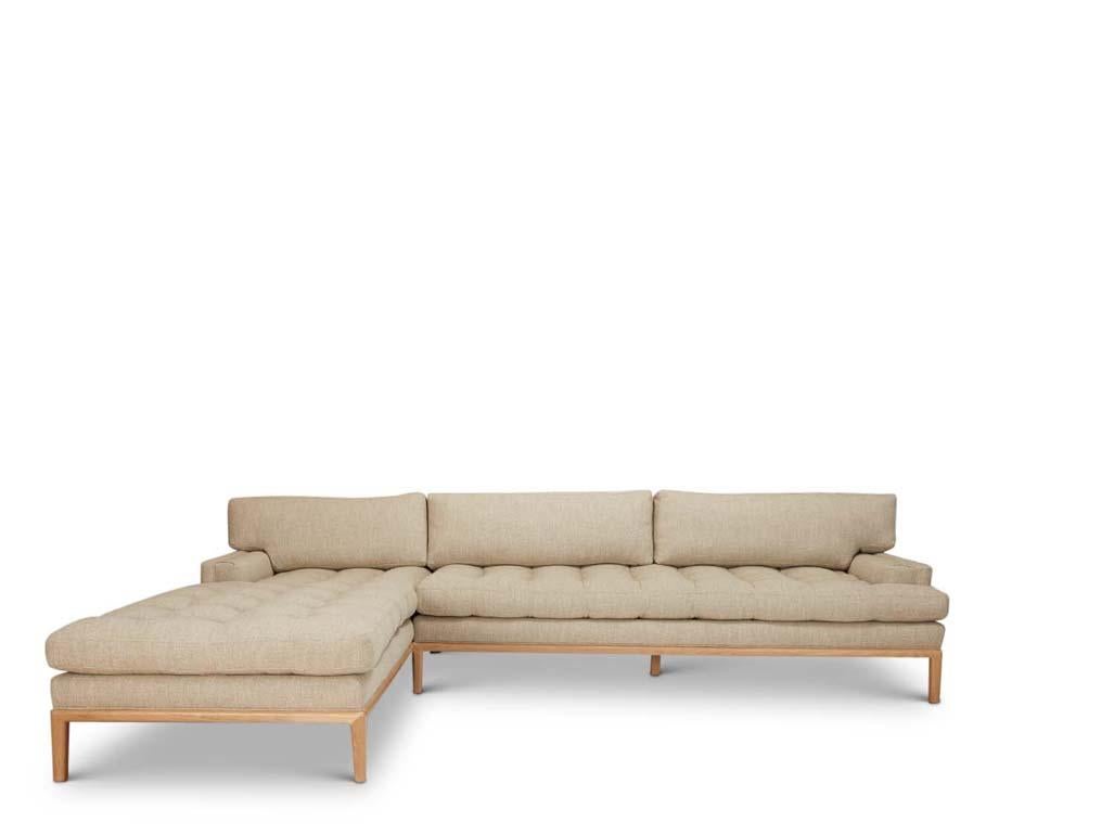 The finely tailored two piece Forster Sectional consists of a bench sofa and a generous chaise which can be specified to land on either side. This sectional rests atop an elegantly tapered solid wood base. Also available as a sofa.

The