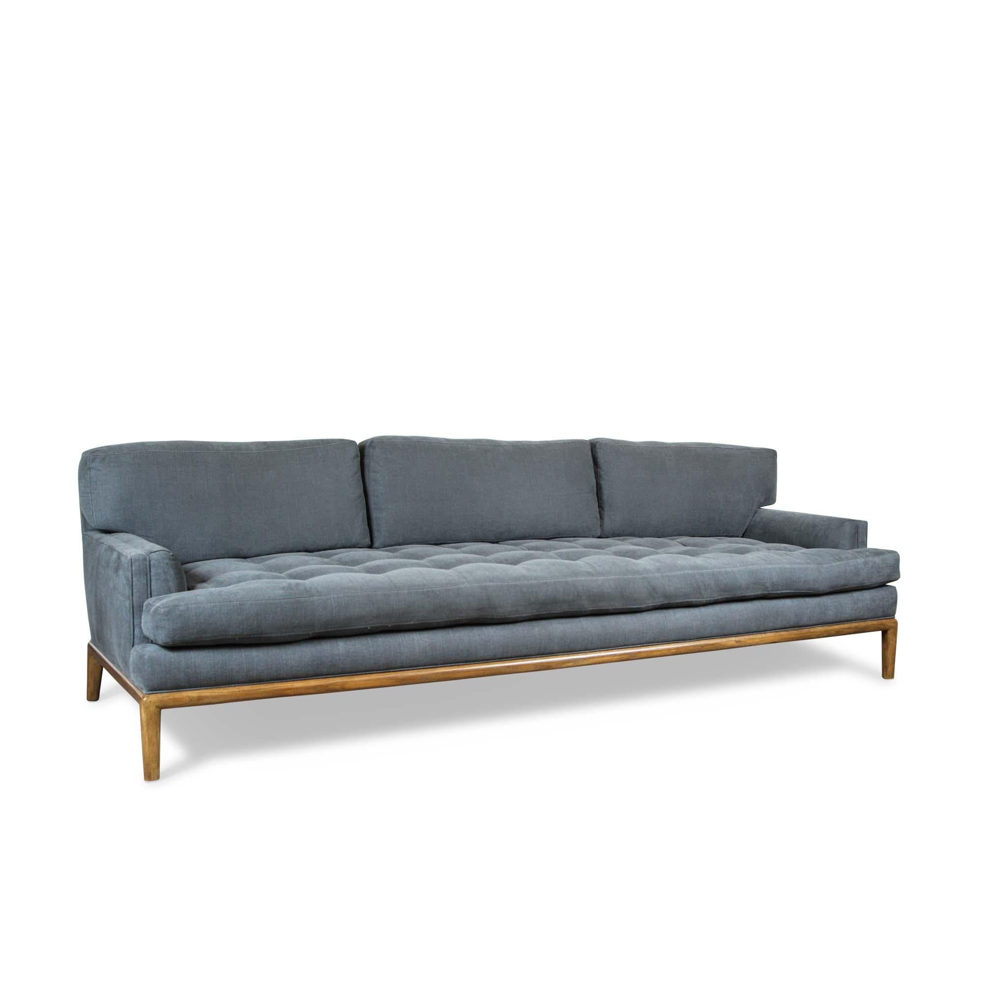 The Forster sofa is a midcentury inspired sofa with a loose tufted seat, loose back cushions, and piped details. The sofa rests atop a simple, rounded wood base.

The Lawson-Fenning Collection is designed and handmade in Los Angeles,