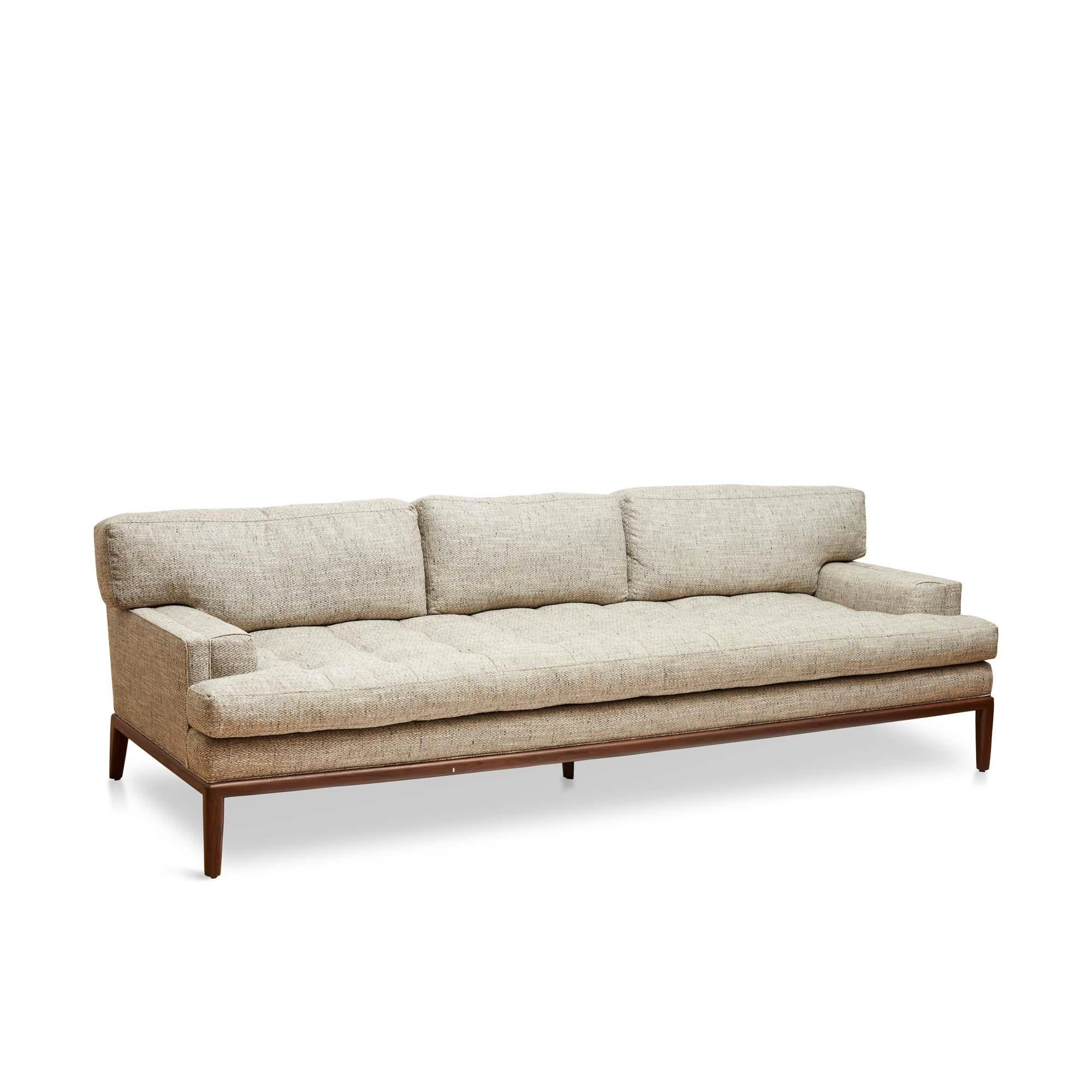 The Forster sofa is a midcentury inspired sofa with a loose tufted seat, loose back cushions, and piped details. The sofa rests atop a simple, rounded wood base.

The Lawson-Fenning Collection is designed and handmade in Los Angeles,