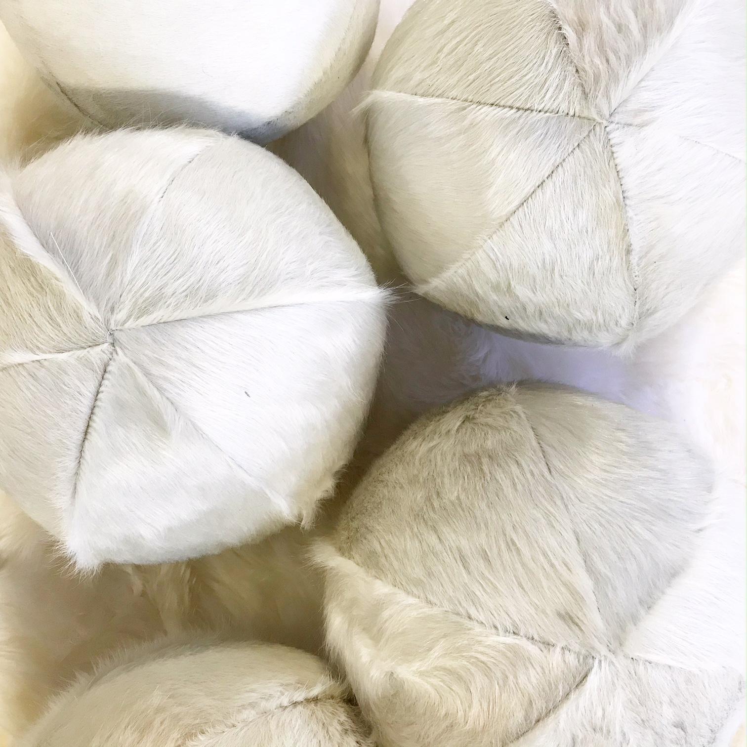 Our cowhide balls are handcrafted from our beautiful Forsyth Brazilian cowhides. The most beautiful hides are selected, hand cut, hand stitched, and hand stuffed with the finest insert. Each step is meticulously curated by Saint Louis based Forsyth