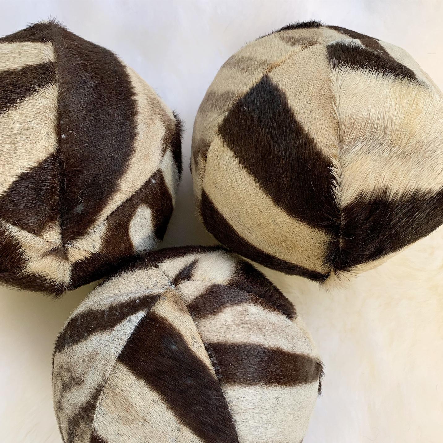 Our zebra balls are handcrafted from our beautiful Forsyth zebra hides. The most beautiful zebra hides are selected, handcut, handstitched, and hand stuffed with the finest insert. Each step is meticulously curated by Saint Louis based Forsyth