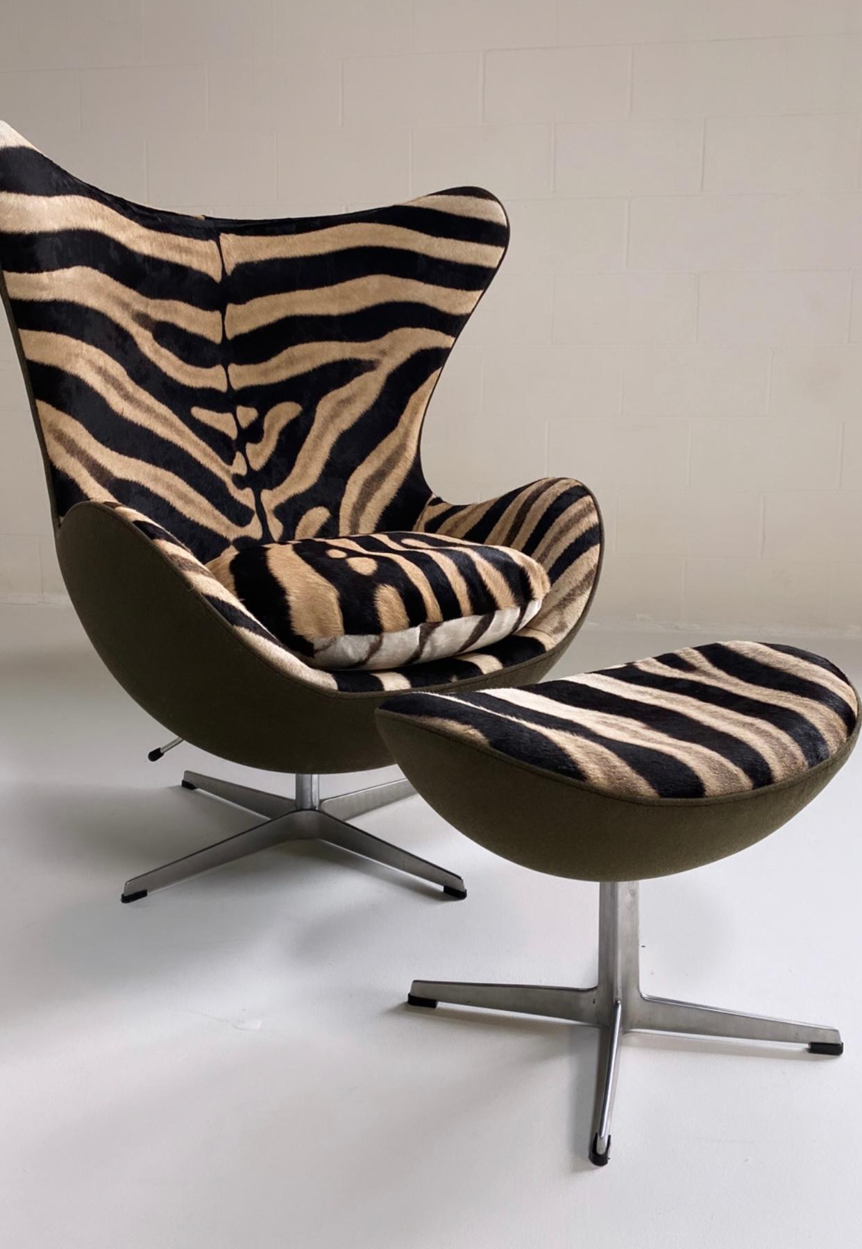 We have an incredible collection of vintage chairs and design icons waiting for a new life. Our authentic, upcylced Egg Chairs are some of our most popular designs. 

This egg chair and Ottoman will be made to order and restored in zebra hide and