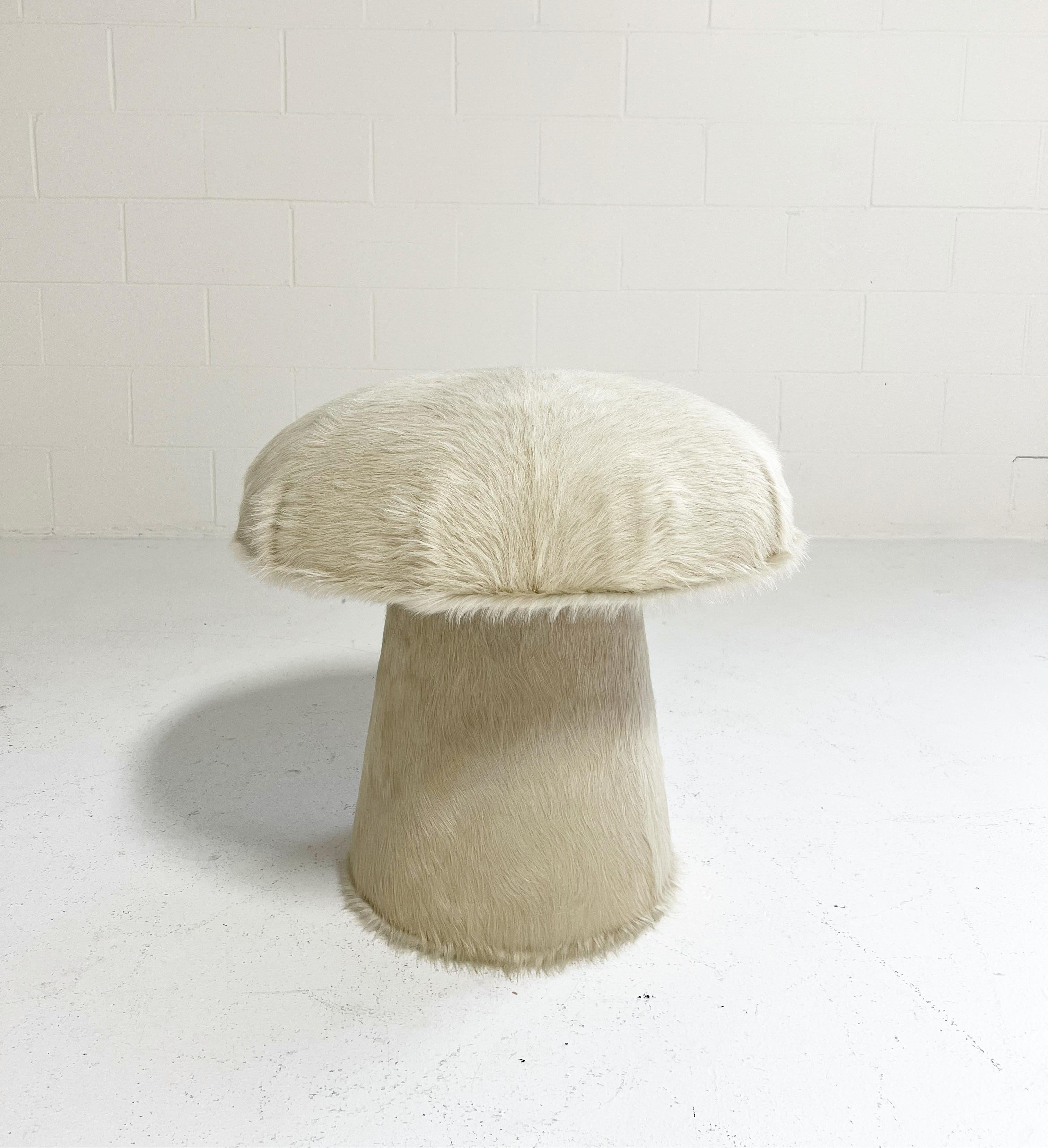 This Forsyth mushroom pouf ottoman was created and designed by the Forsyth design team. Each ottoman is handcrafted in Saint Louis. A cute decorative piece for any room adding texture, color, and a bit of whimsy. The perfect ottoman or extra seat.