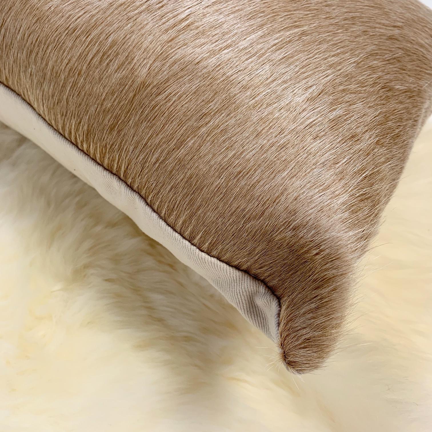Forsyth cowhide pillows are simply the best. The most beautiful cowhides are selected, handcut, handstitched, and hand stuffed with the finest goose down. Each step is meticulously curated by Saint Louis based Forsyth artisans. 

Details:
13 x 21