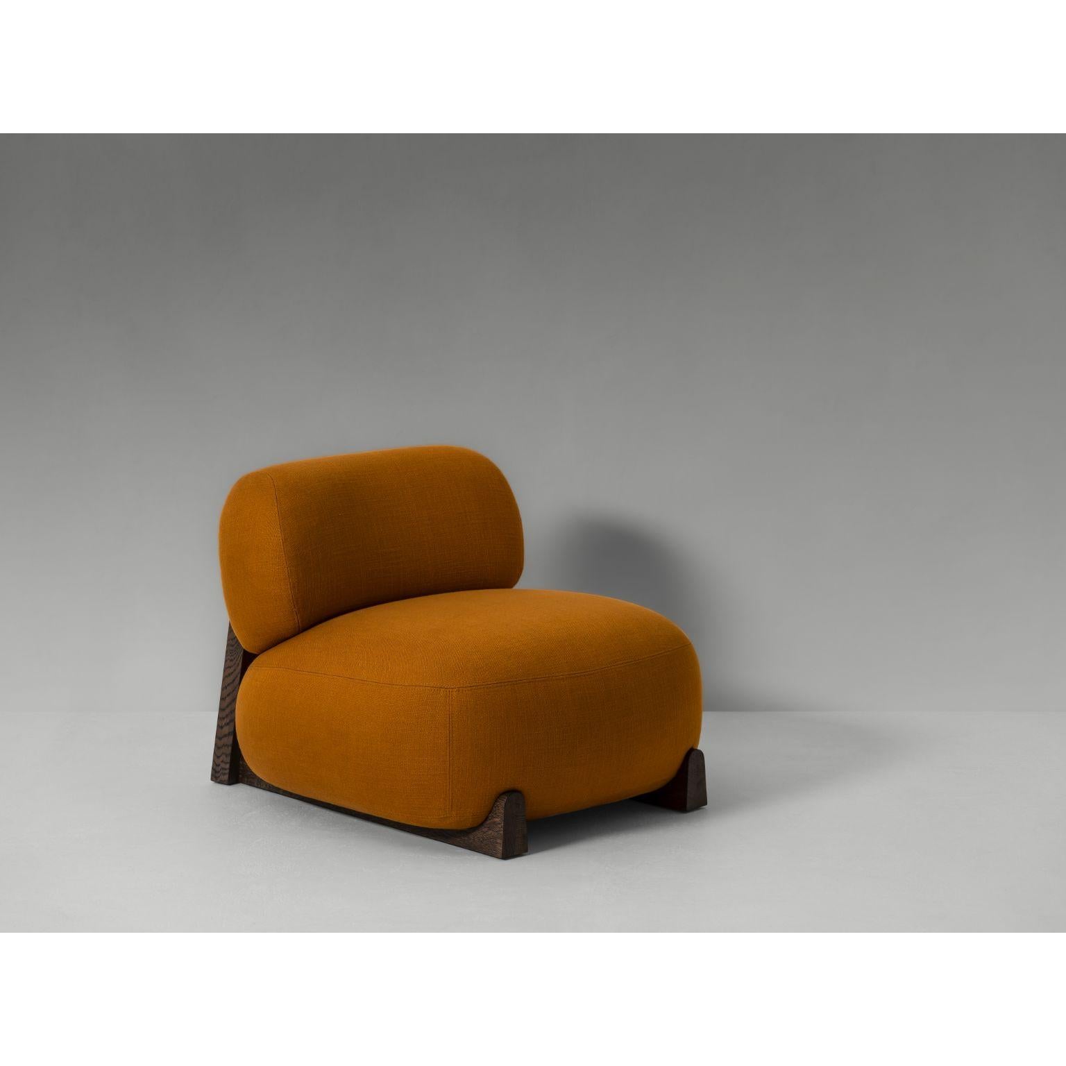 Fort Lounge Chair by Van Rossum
Dimensions: D 85 x W 90 x H 68 cm
Materials: Oak Grey Pepper Brushed, Fabric.

A low-slung lounge chair and sofa, featuring a wide and thick cushioned seat and delicately curved backrest that together provide ample