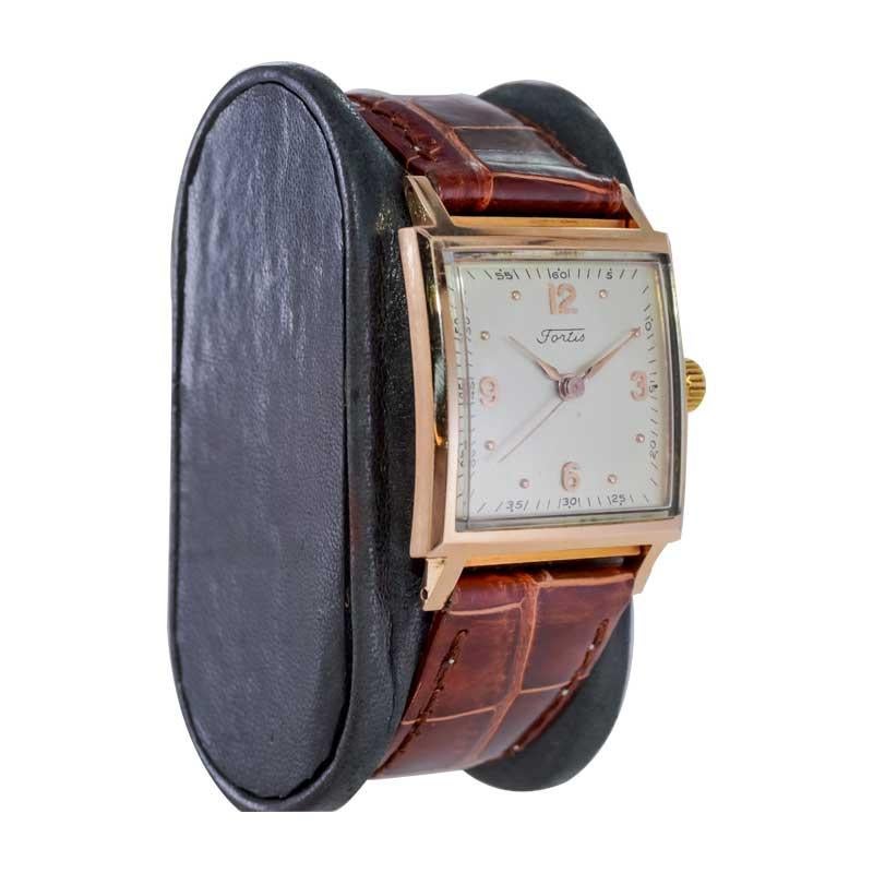 FACTORY / HOUSE: Fortis Watch Company
STYLE / REFERENCE: Art Deco / Square
METAL / MATERIAL: 18k Pink Gold
CIRCA / YEAR: 1940's 
DIMENSIONS / SIZE: Length 28mm X Width 38mm
MOVEMENT / CALIBER: Manual Winding / 17 Jewels / Caliber 1080
DIAL / HANDS: