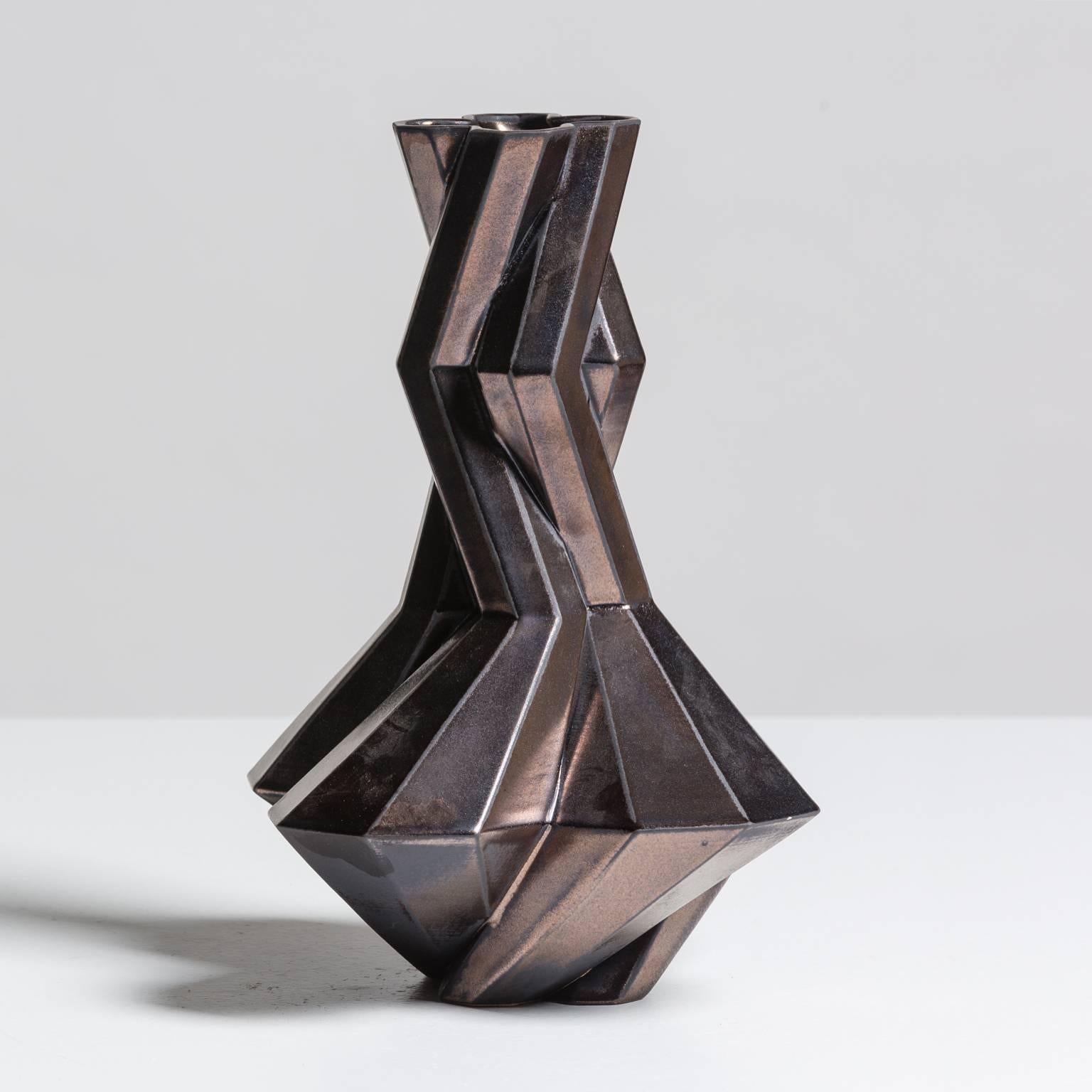 Lara Bohinc continues to work with ancient and futuristic forms with new Fortress designs, further exploring the complex geometry of this range. The hexagonal shapes interlock and embrace, creating a dynamic play of light and shade on the many