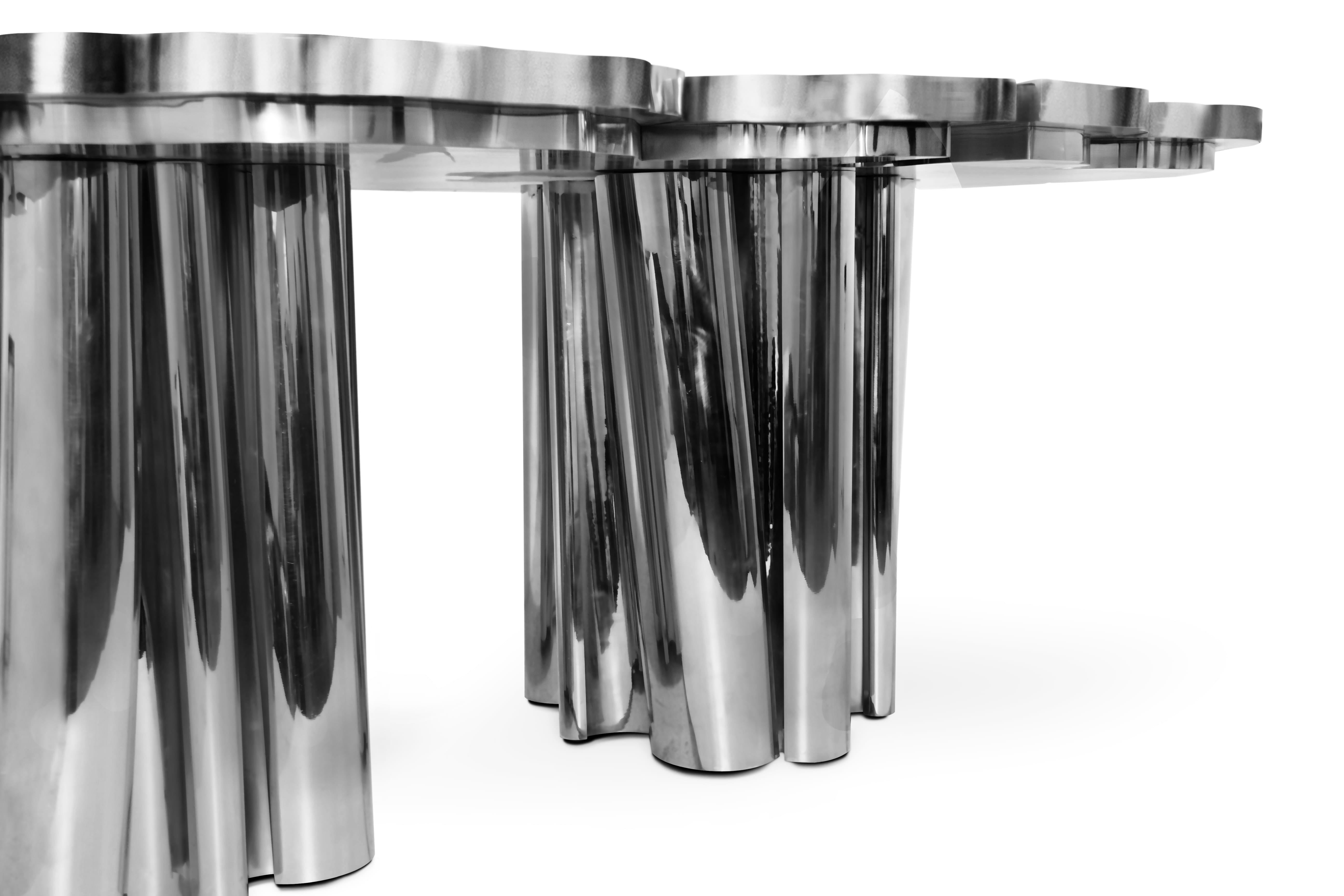 The Fortuna Dining Table is a shimmering statement piece that unites Boca do Lobo's one of a kind design aesthetic and passion for Gold. Representing the essence of empowerment, sophistication, mystics, and enticement, the Fortuna features a one of