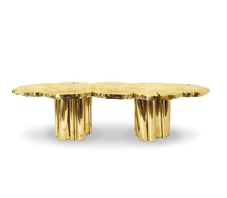 Fortuna is a contemporary dining table with a one-of-a-kind design aesthetic and refined statement to the most influential minds. Representing the essence of empowerment, sophistication, and mystics, the Fortuna features an exclusive gold brass