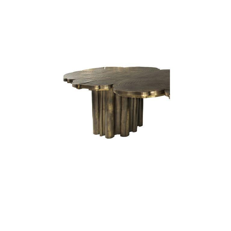 Fortuna is a contemporary dining table with one-of-a-kind design aesthetic and refined statement to the most influential minds. Representing the essence of empowerment, sophistication, and mystics, the Fortuna features an exclusive patina brass