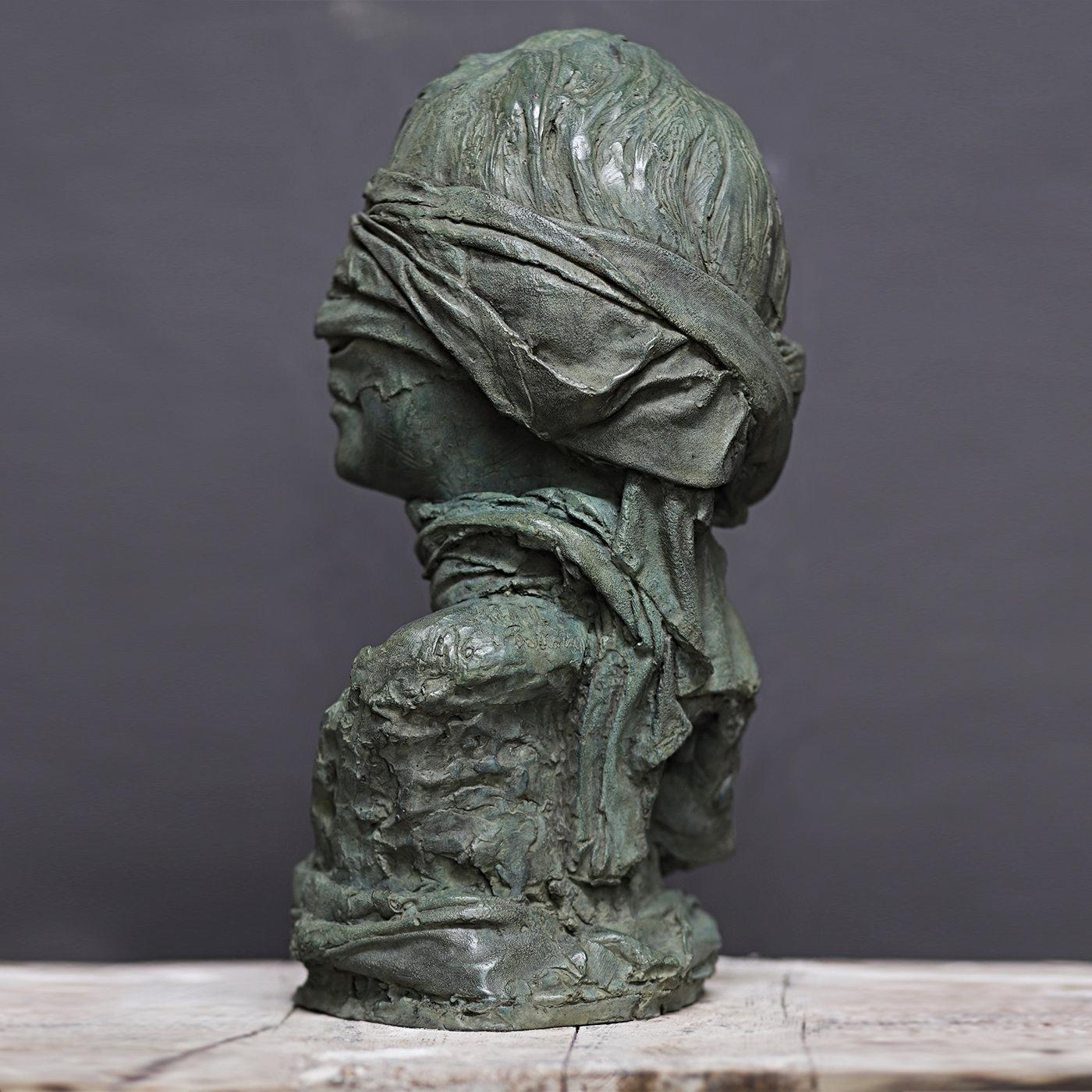 This splendid artwork was handmade by the sculptor Raffaello Romanelli in 2018. It depicts the bust of a woman with blindfolded eyes, the traditional iconography of the Roman Godess, Fortune. This exquisite decorative object boasts a sublime