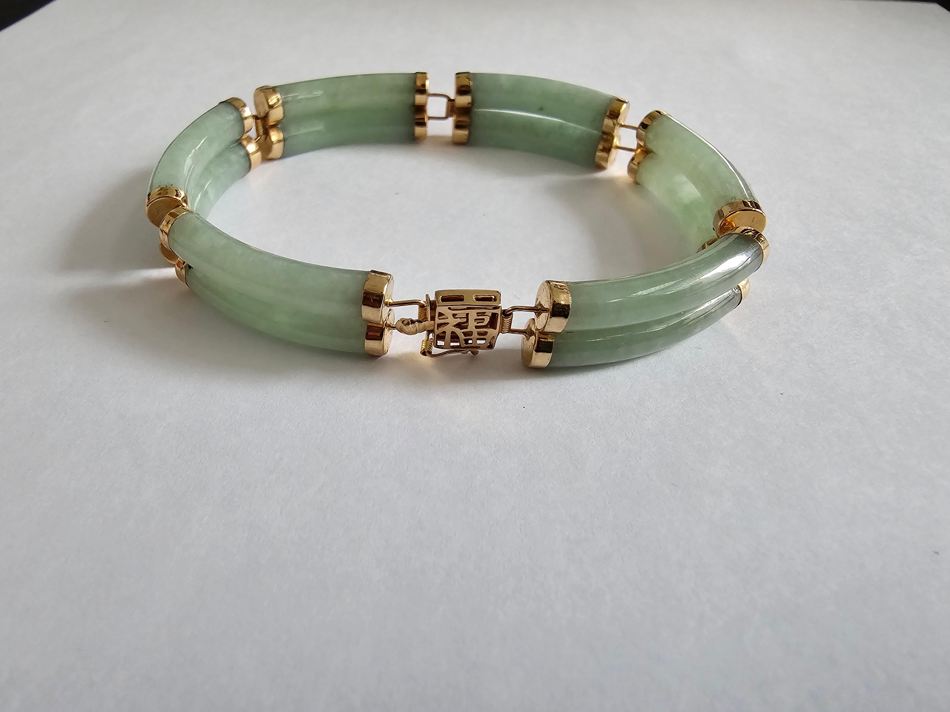 jade bracelet with gold clasp