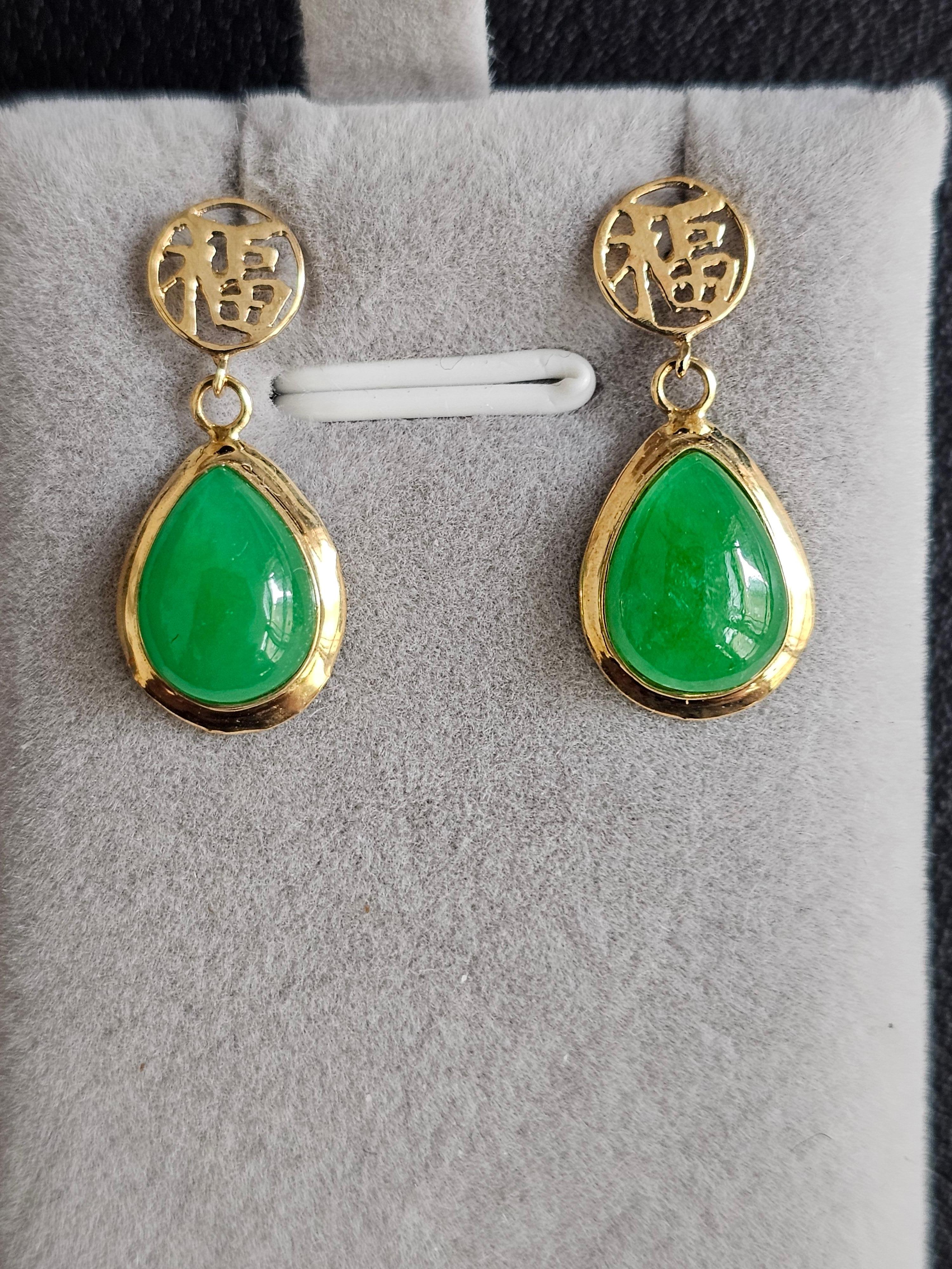 Fortune Drop Green Jade Earrings With 14K Solid Yellow Gold symbol.

The 'Fu Fuku Fortune Jade Earrings' symbolize courage and prosperity. Where the Han character 'Fu' (Mandarin) and 'Fuku' (Japanese) ties in these earrings to the clip, it dangles