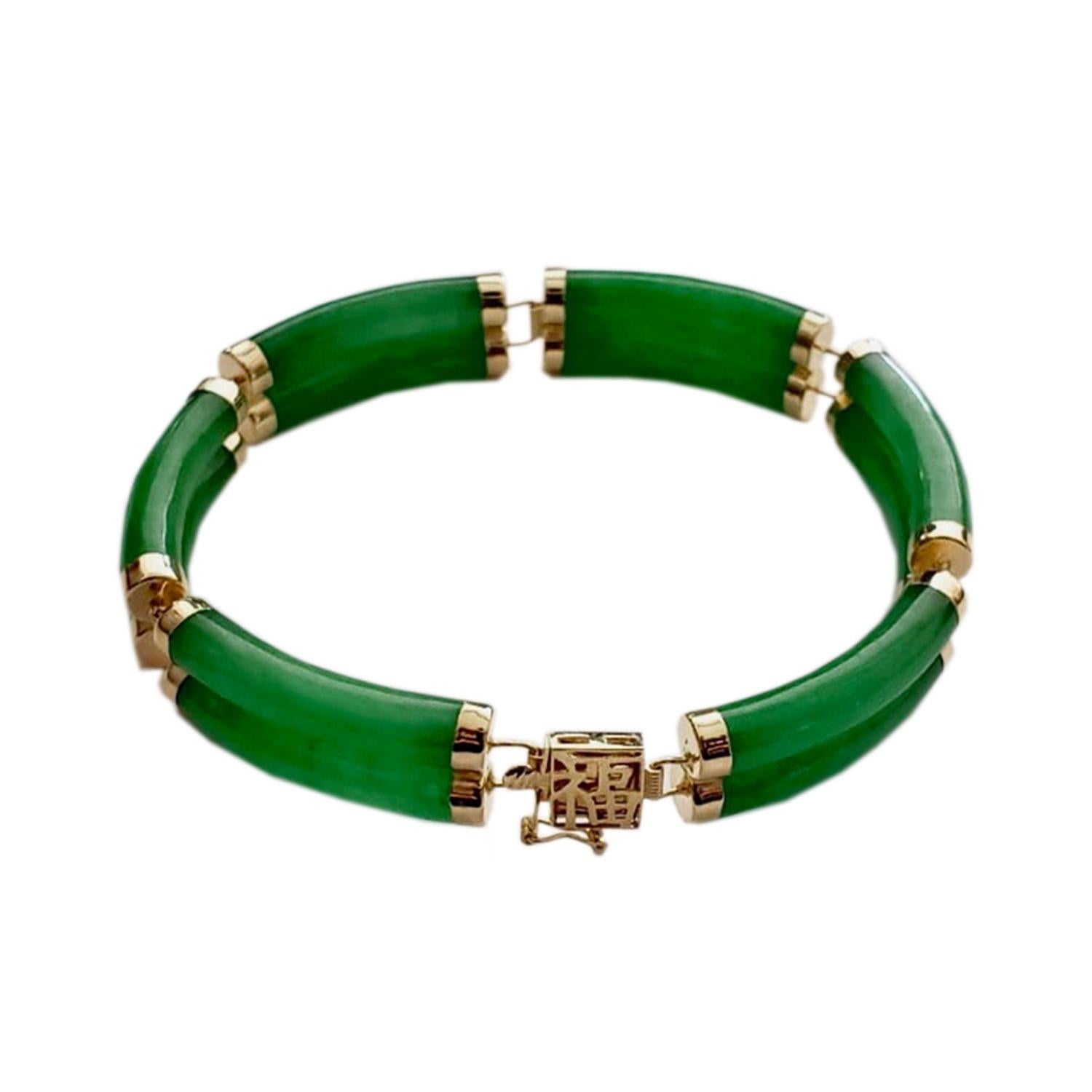 Fortune Jade Bracelet Double Bars with 14K Solid Yellow Gold links and clasp

Our 'Double Fu Fuku Fortune Jade Bracelet' embodies radiance and stature, with hand carved jade lengths intertwined with 14K Gold; a unisex statement. The two layers of