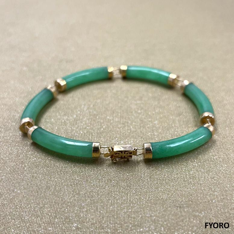 Fortune Jade Tube Bars Bracelet with 14K Solid Yellow Gold links and clasp

The ‘Fu Fuku Fortune Jade’ Bracelet uses ancient oriental techniques to create a cylindrical design. Easy-to-wear, yet weighted. Our best-selling Bracelet, perfect for