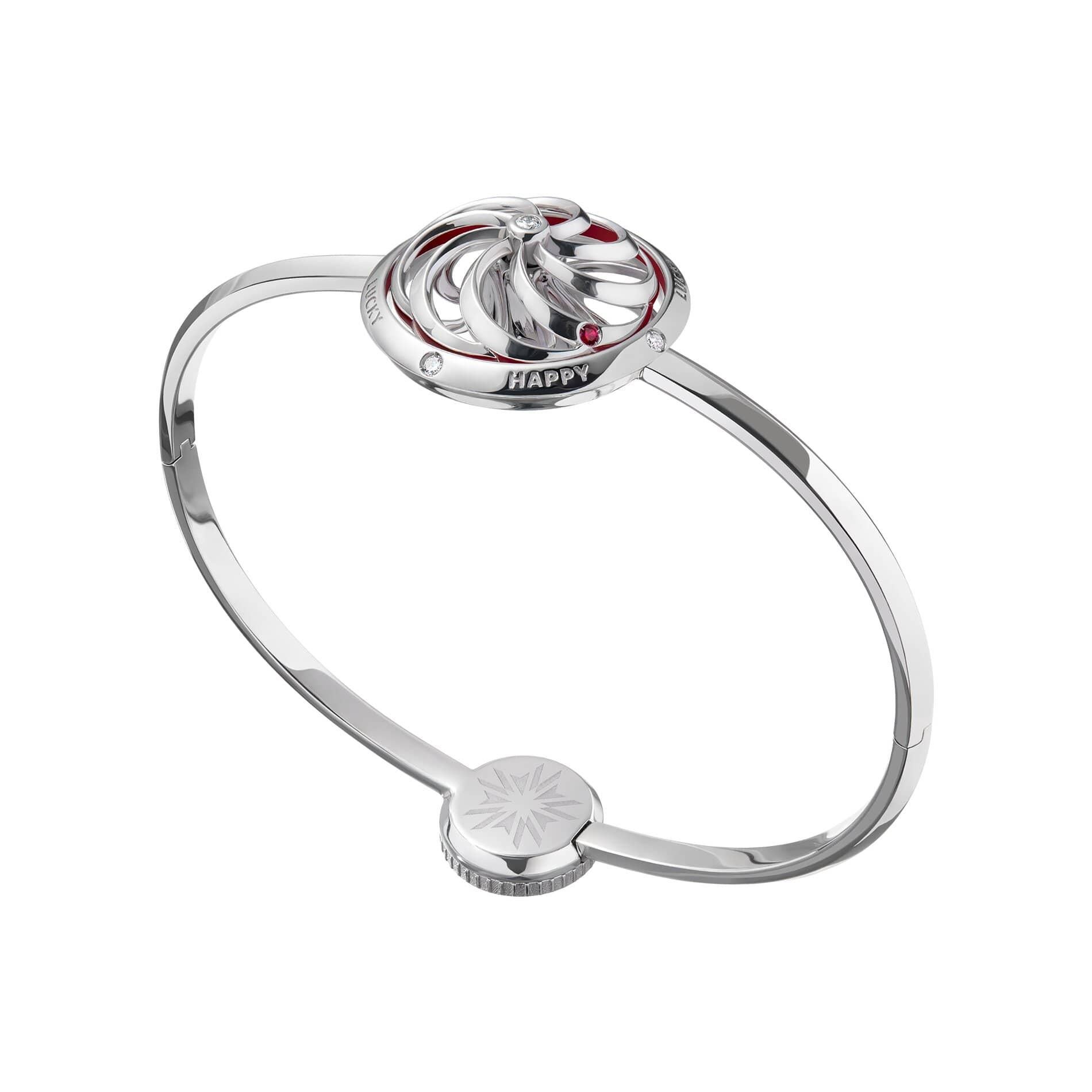 This sophisticated white gold Fortune kinetic bracelet is sure to encourage you to be bold, be brave, and grasp life with the belief that luck is on your side. Combines future-facing mystery with our signature Sybarite kinetic mechanism, watch the