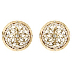 Boucles d'oreilles cinétiques Fortune en or jaune avec diamants blancs