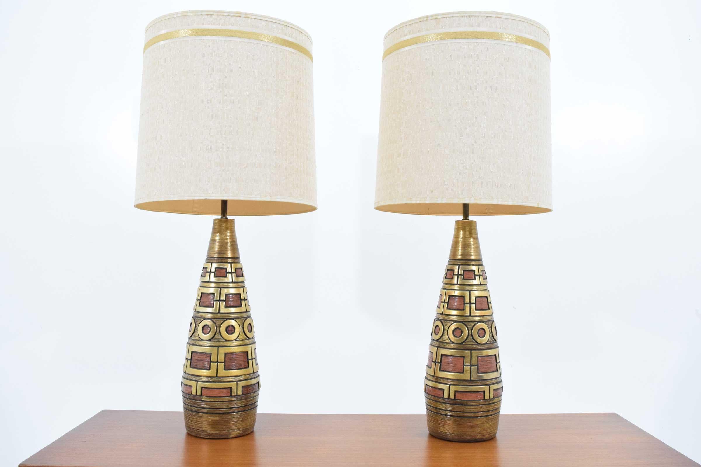 A beautiful pair of lamps by Fortune Lamp Company signed and dated 1959. Lamps are 40.5