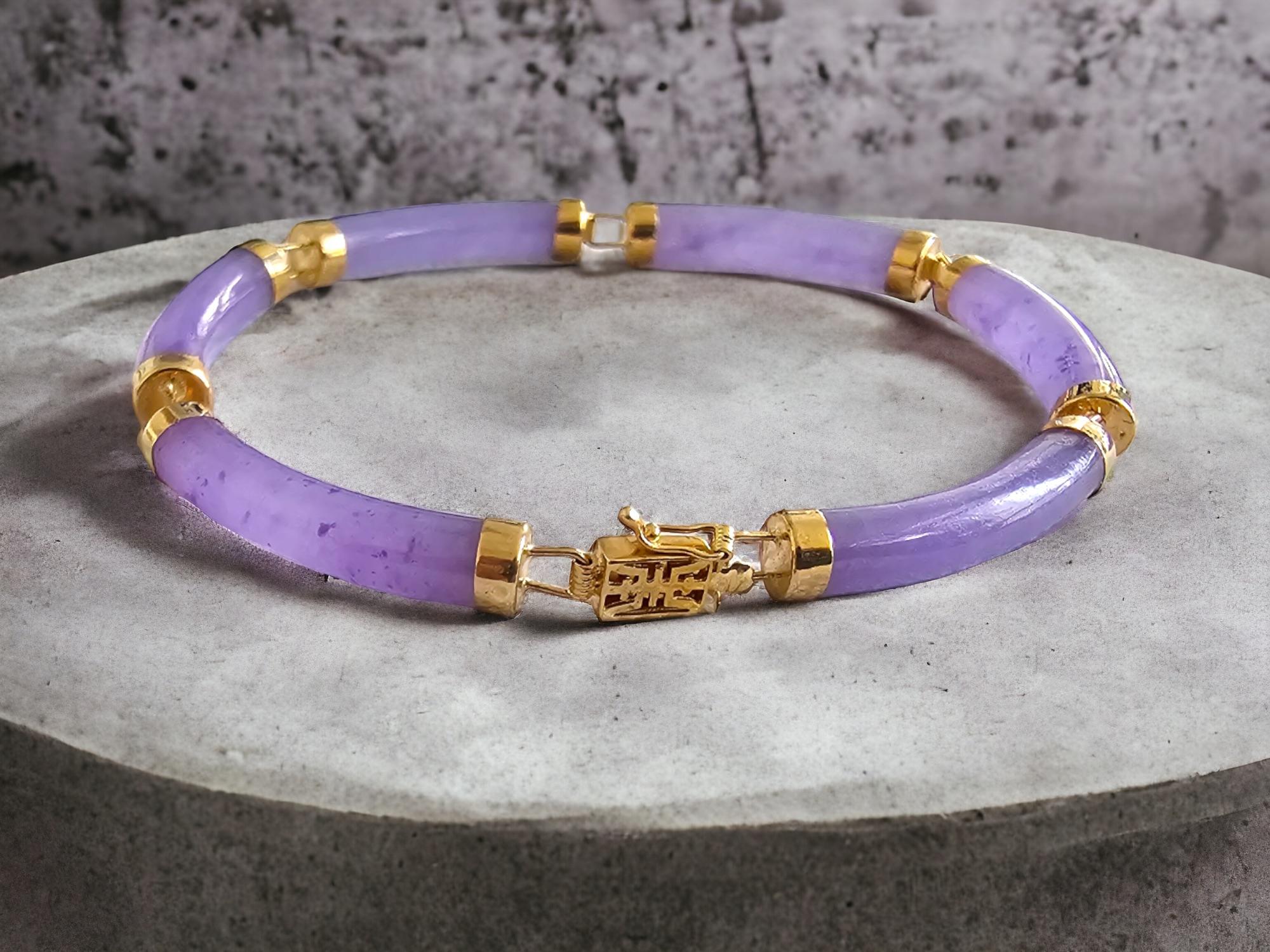 Fortune Purple Jade Tube Bars Bracelet with 14K Solid Yellow Gold links and clasp

The ‘Fu Fuku Fortune Jade’ Bracelet uses ancient oriental techniques to create a cylindrical design. Easy-to-wear, yet weighted. Our best-selling Bracelet, perfect