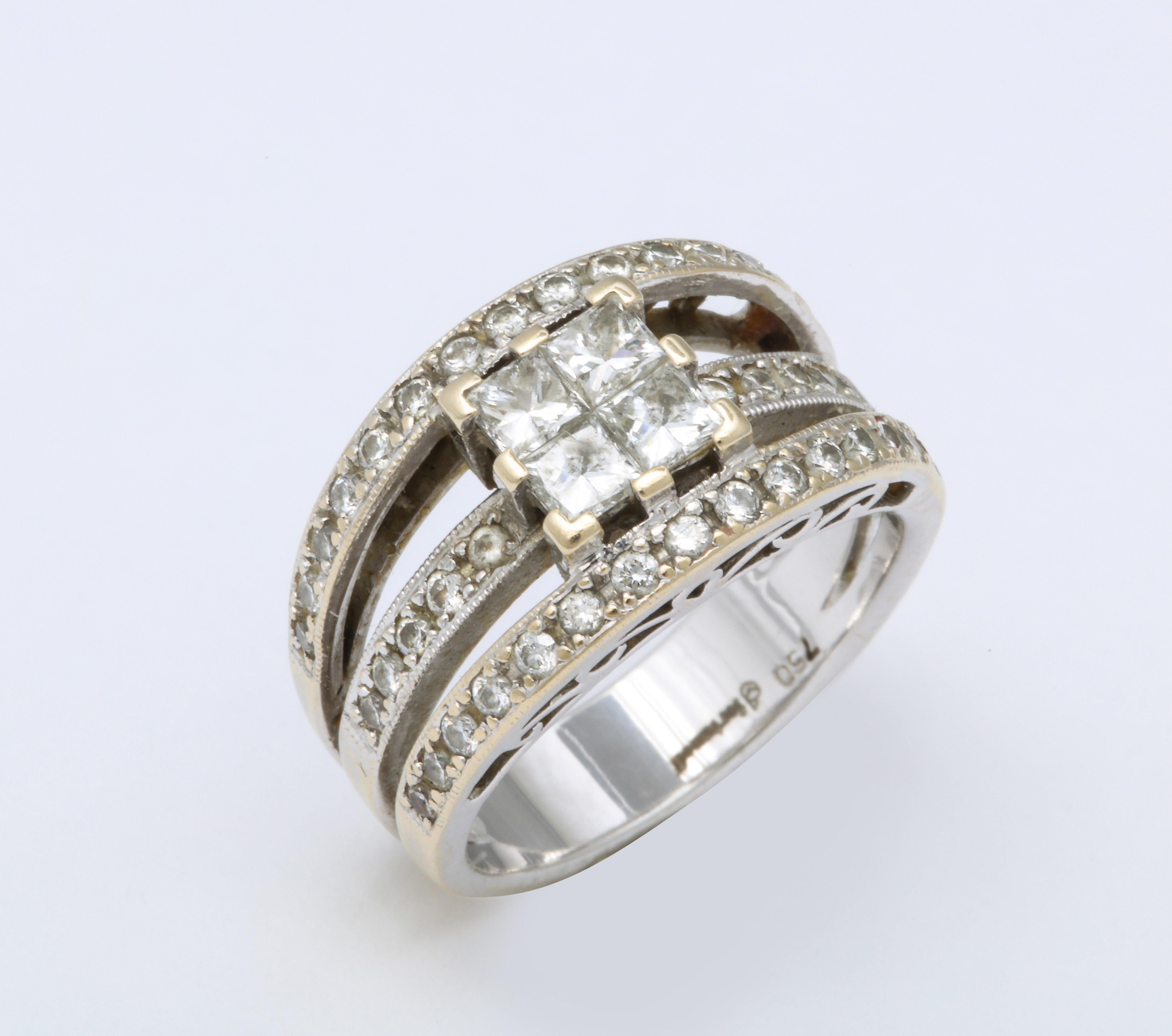 This signed Fortunoff Diamond Cocktail  Ring could be worn as a wedding ring as it has three bands of diamonds flanking a center of four Princess cut diamonds which can appear as one square diamond.  The  four center diamonds are approximately 1