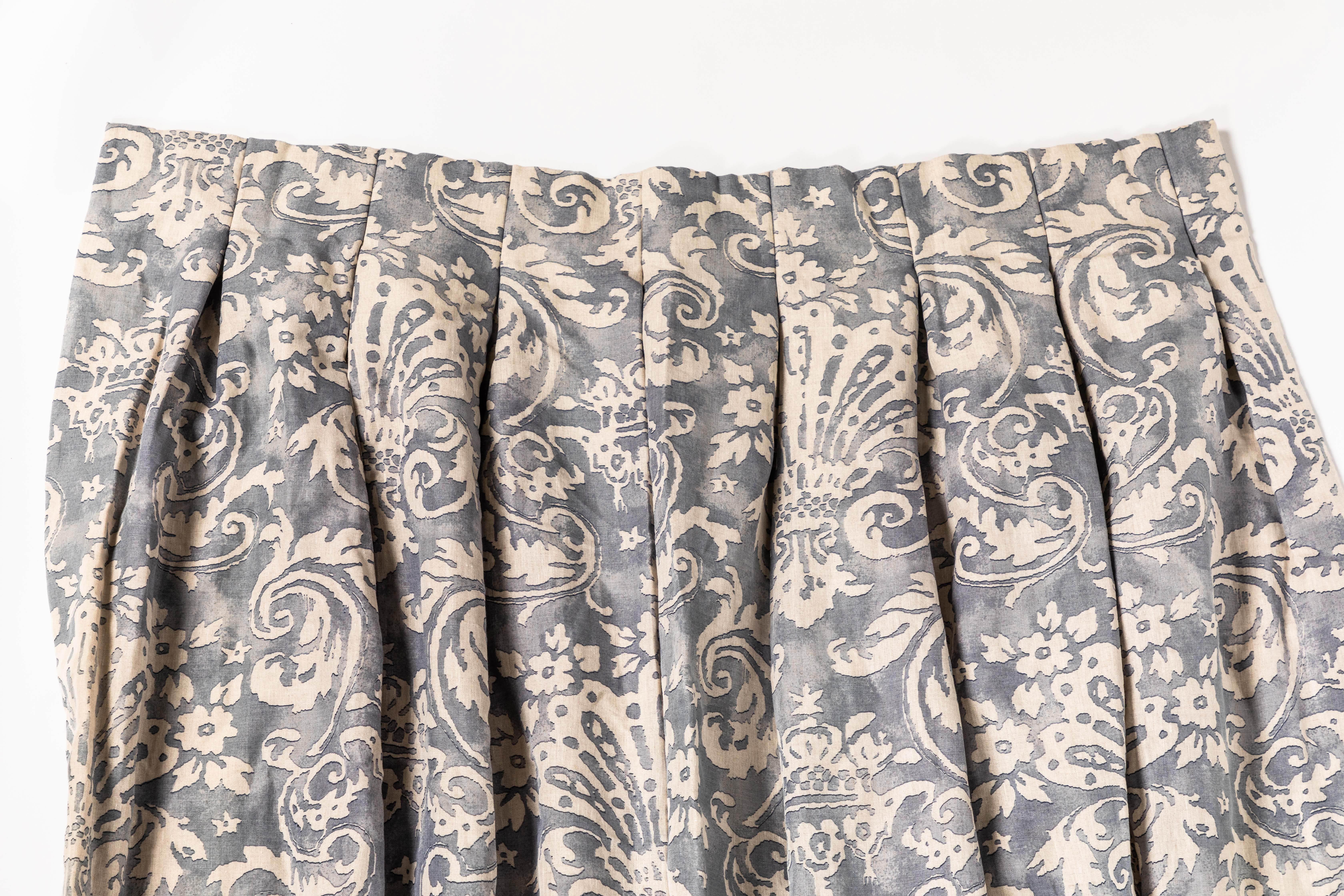 Set of eight (8) Classic damask printed cotton panels with pleated tops by Fortuny. Lining is ivory, made in the 20th century. The width at the top is 36