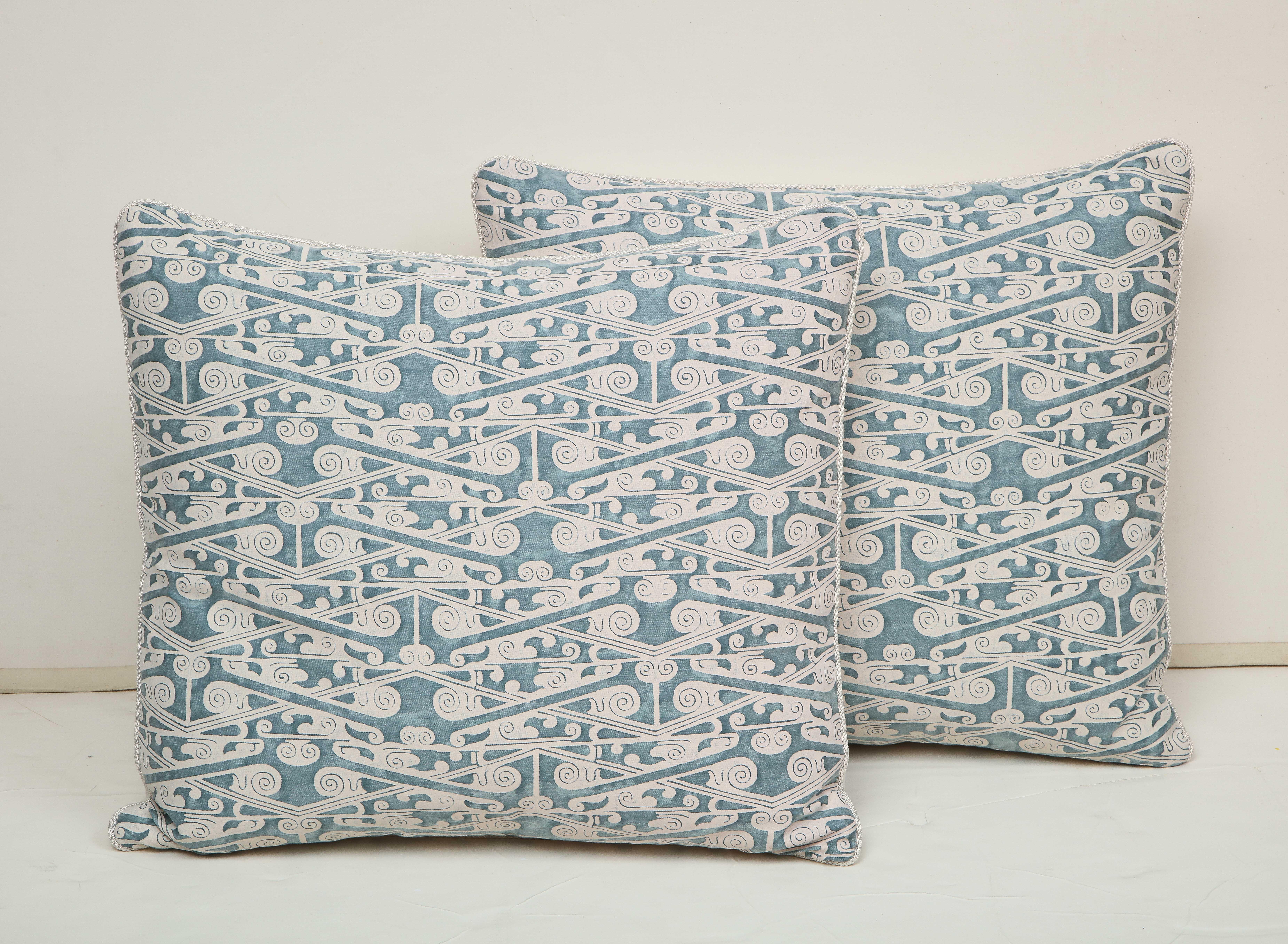 Pair of pillows covered in blue and white Fortuny silk and backed with natural linen. Individually priced at $475 each.