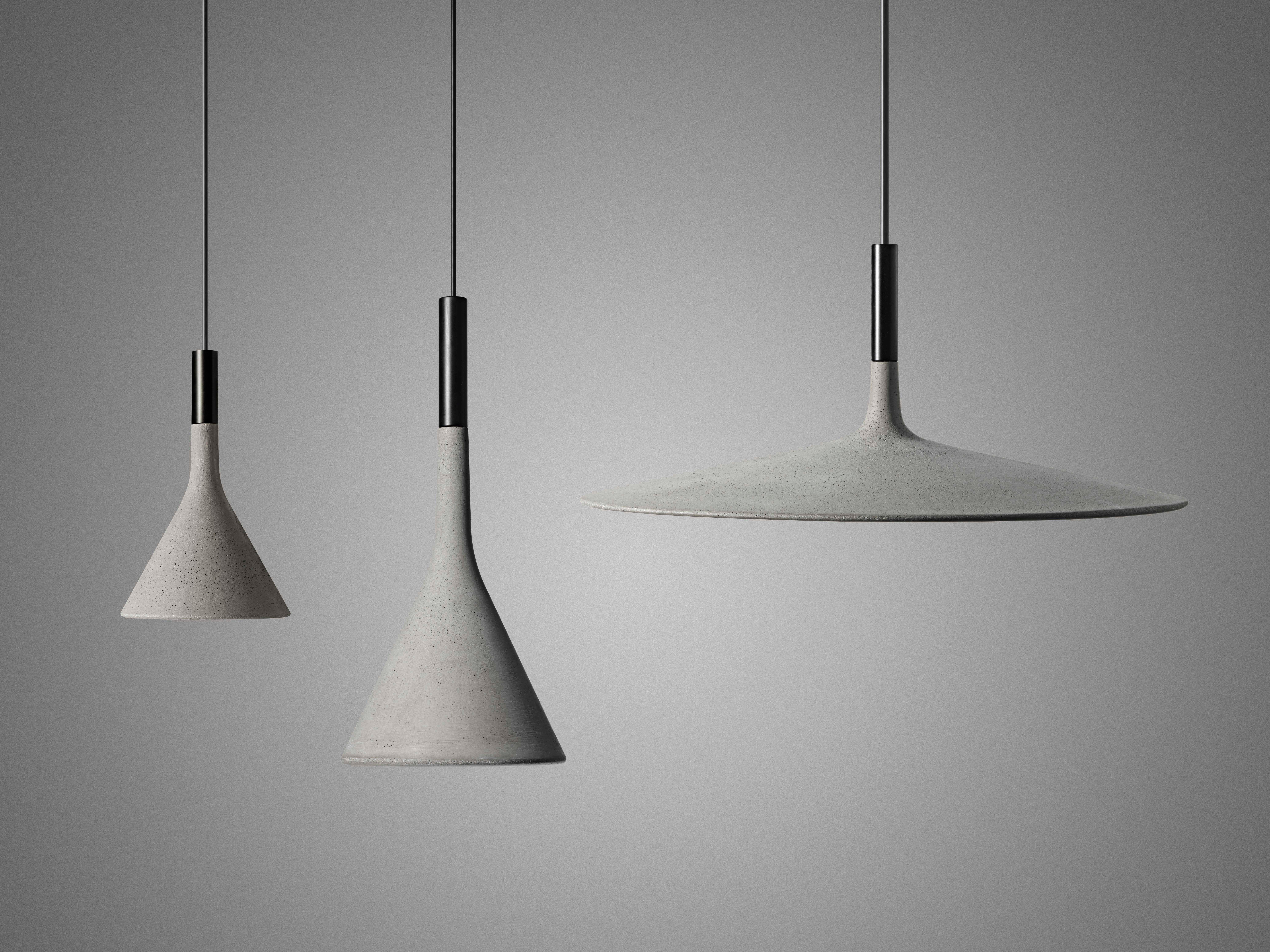 Suspension lamp with direct light. Cement diffuser, consisting off a special amalgam colored with pigments, produced by pouring the fluid mixture into a mold rose with galvanized metal bracket and batch dyed ABS cover. Black electrical cable and