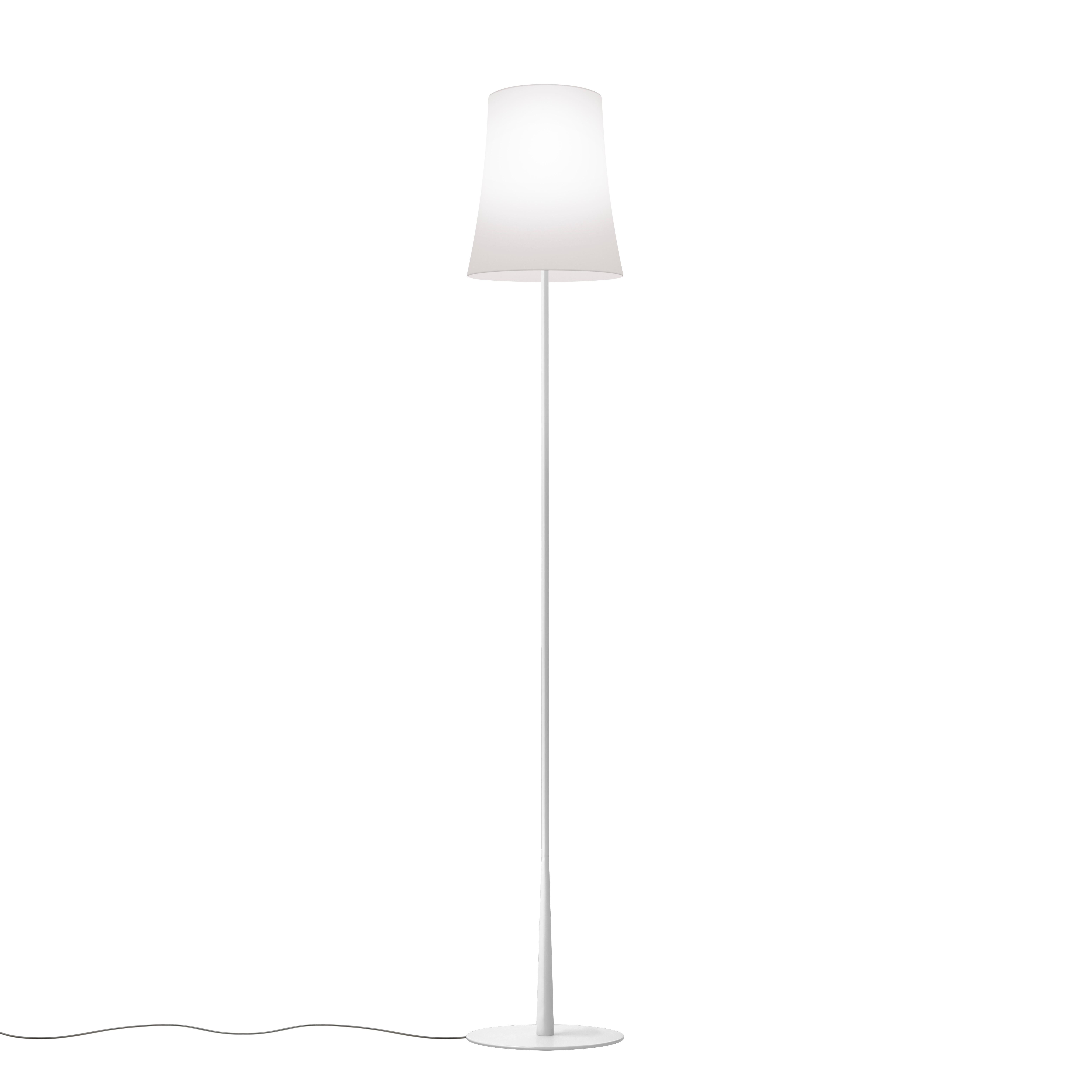 Floor and reading lamp with diffused light. Die cast zinc alloy base and steel rod, both liquid coated. Opaline polycarbonate internal diffuser, translucent polycarbonate external diffuser, both injection molded. The touch dimmer sensor is located