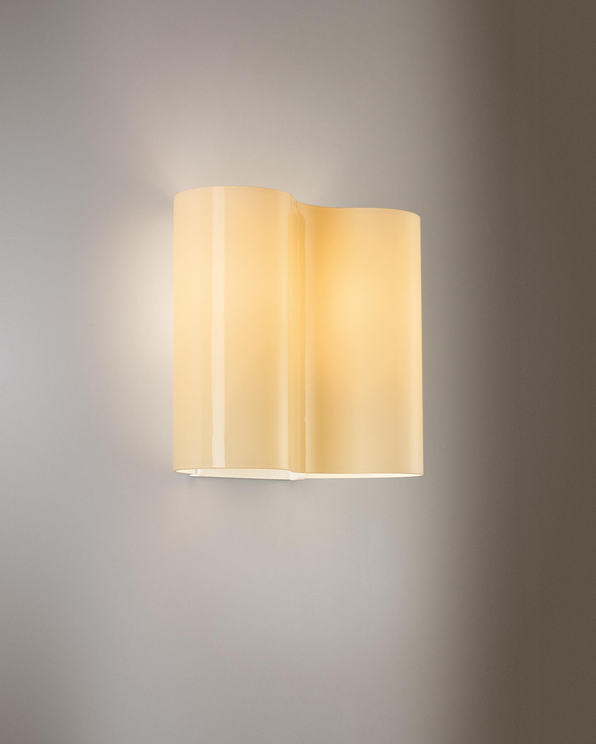 Wall lamp with indirect and diffused light. Hand blown cased glass diffuser achieved using glass blowing procedure without turning the glass in the mold (referred to as 