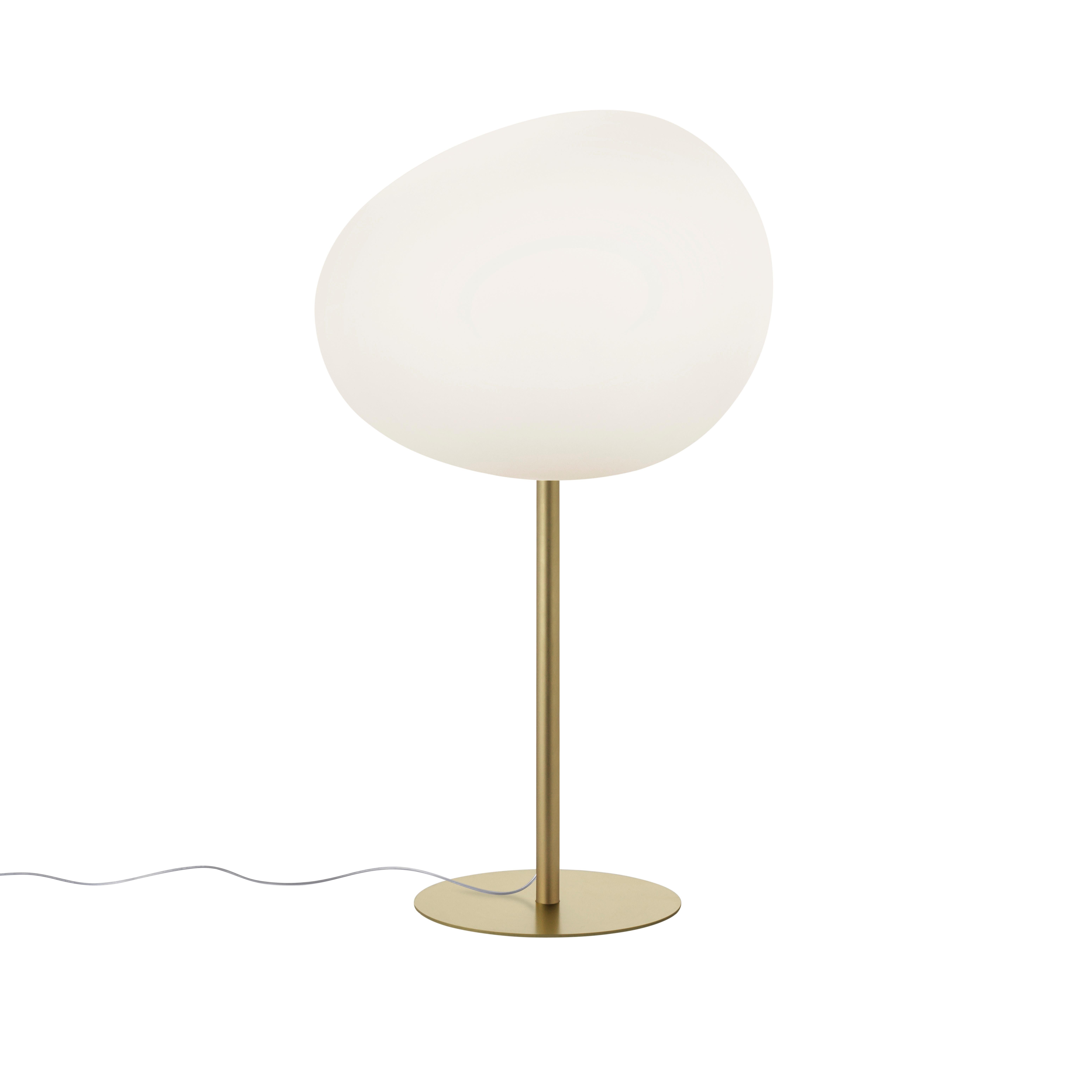 The Gregg table lamps have a delightful organic shape, like pebbles honed by a river, and they are made of hand-blown glass in various sizes.

Materials:
Blown satin glass and lacquered metal.

Light source:
Halo 1x 20W G9.

Color:
White.
