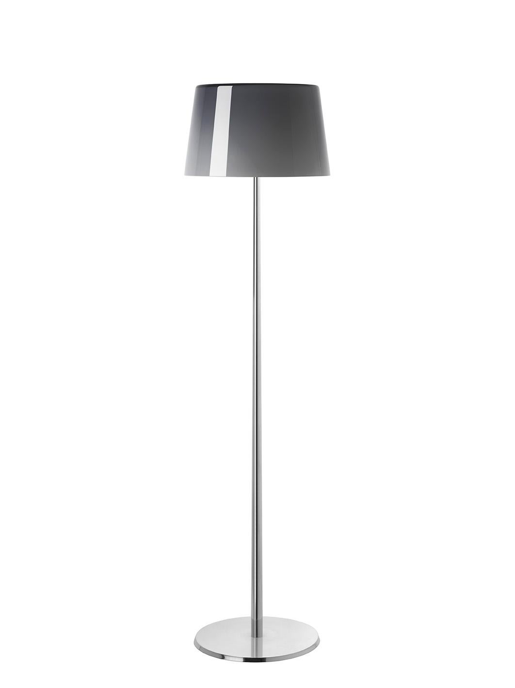 Floor lamp (reading lamp) with direct and diffused light. Hand blown cased glass diffuser with glossy and finish, white on the inside and colored on the outside. Die cast aluminium base and stem is hand and finished and polished, liquid painted in