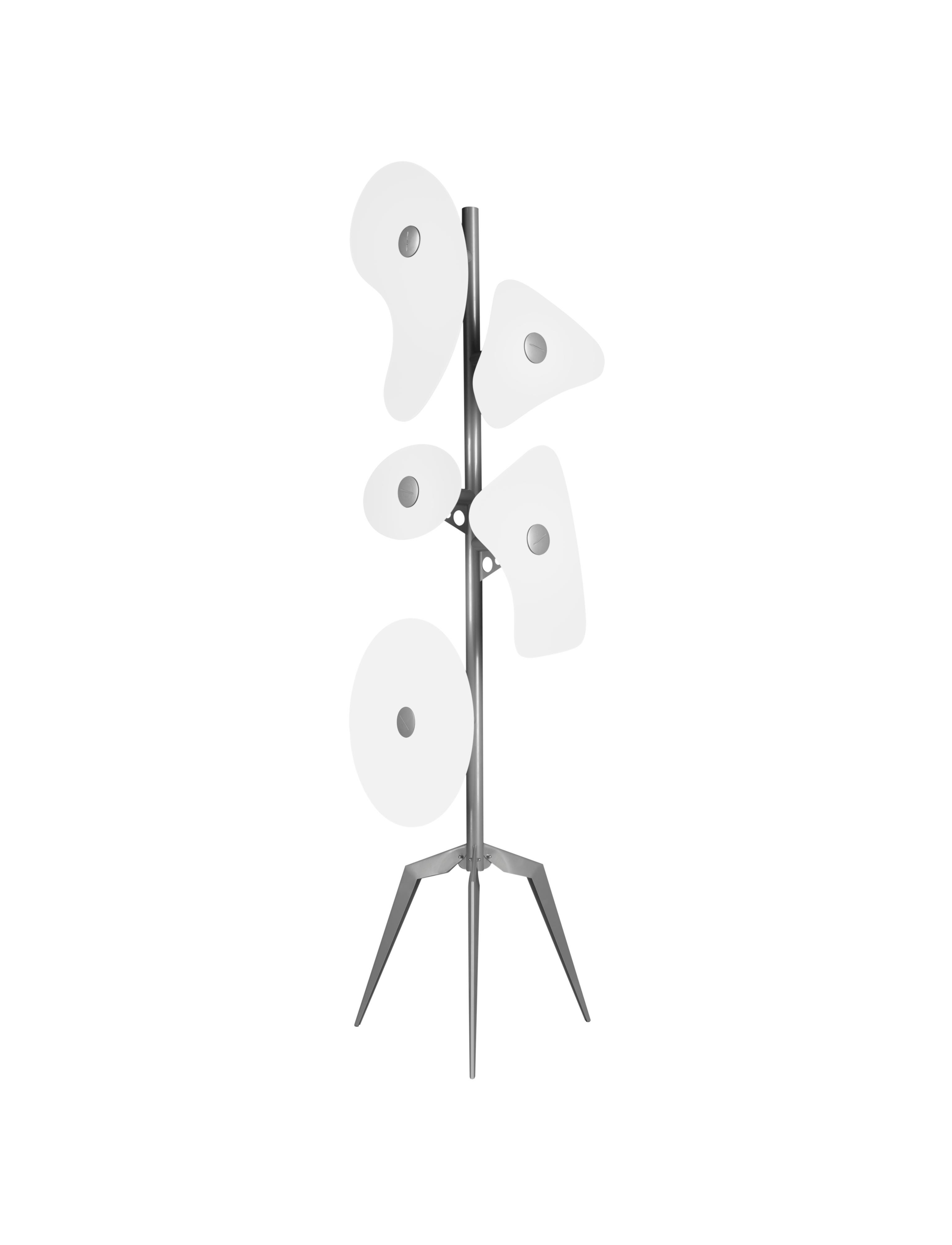 Floor lamp with diffused light. Epoxy powder coated metal tripod central frame and 5 different sized and shaped satin finish colored and painted glass diffusers, which are secured to the frame using epoxy powder coated metal glass-locks. ON/OFF