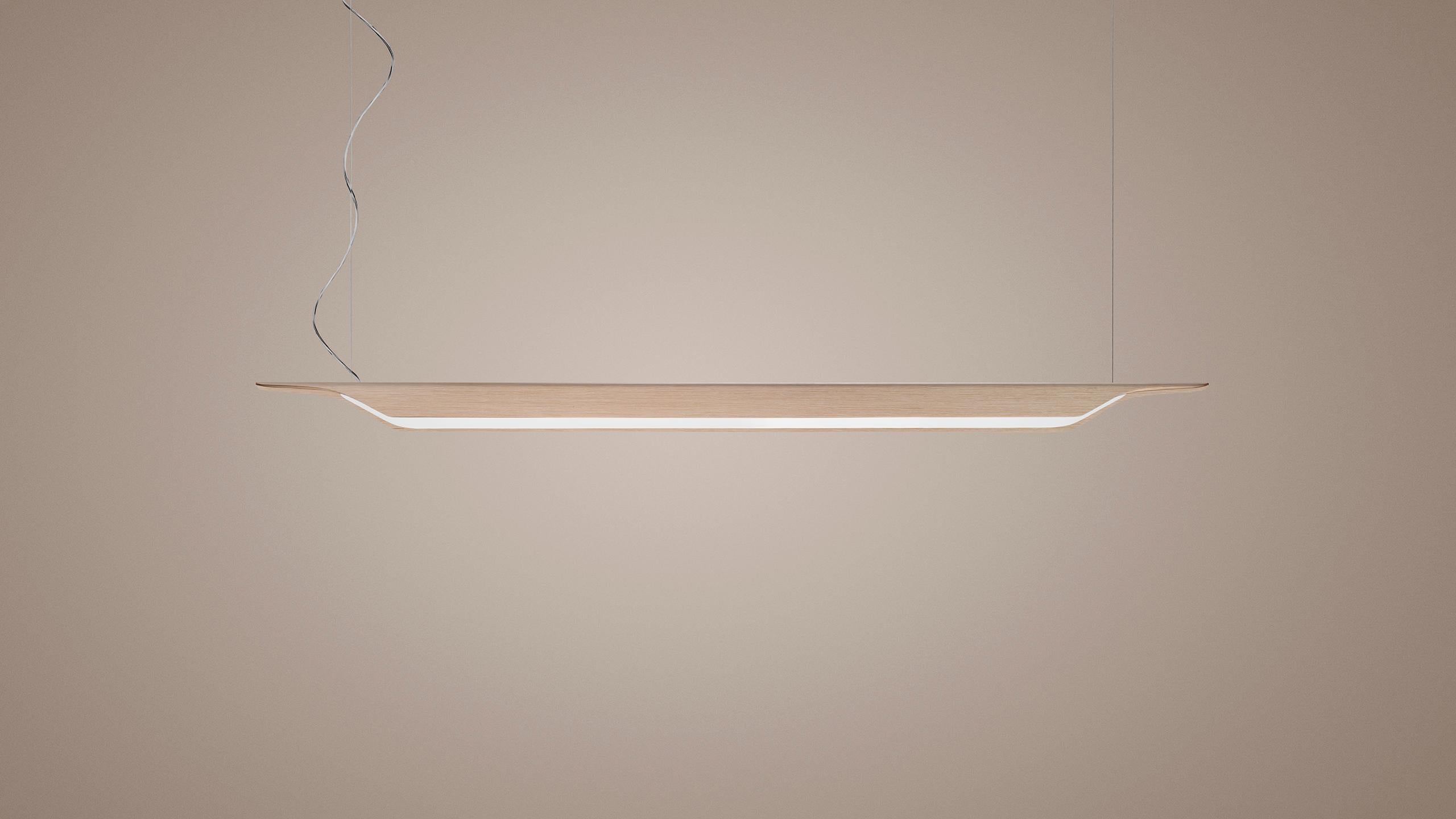 An unprecedented wooden suspension lamp, mid-way between Nordic culture and Mediterranean creativity, Troag is a light and linear sign in space.

Materials:
Curved ash plywood and PMMA

Light source:
Troag media LED
50W 3000 K
6800 lm CRI>90