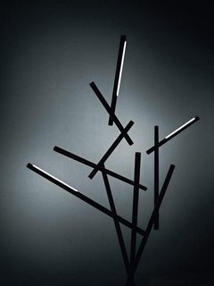 Lámpara de pie Tuareg LED de Foscarini en cromo negro by Ferruccio Laviani